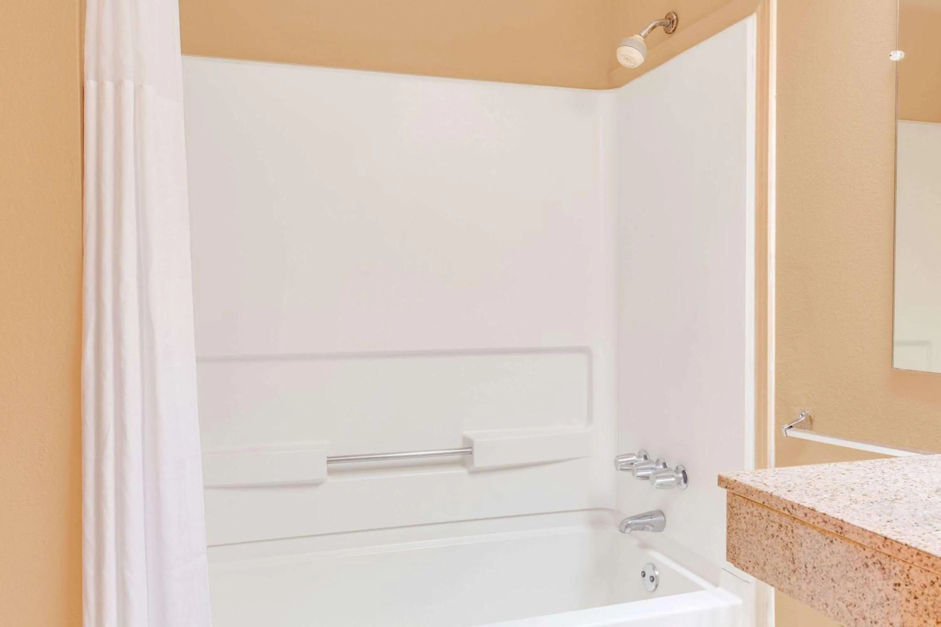 Bathroom in Days Inn by Wyndham Downtown Aiken