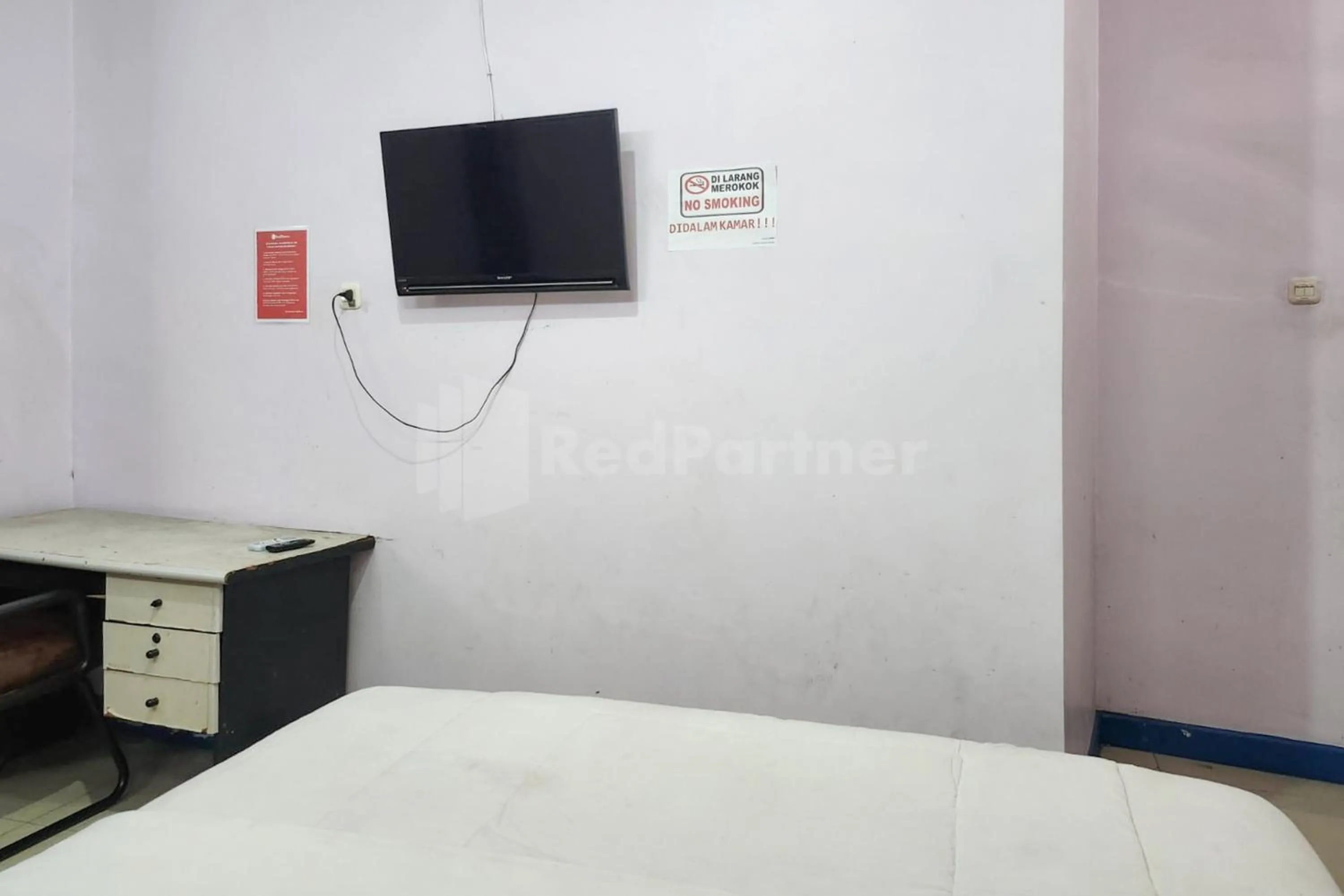 Bed in OYO 1319 Puspita Guesthouse