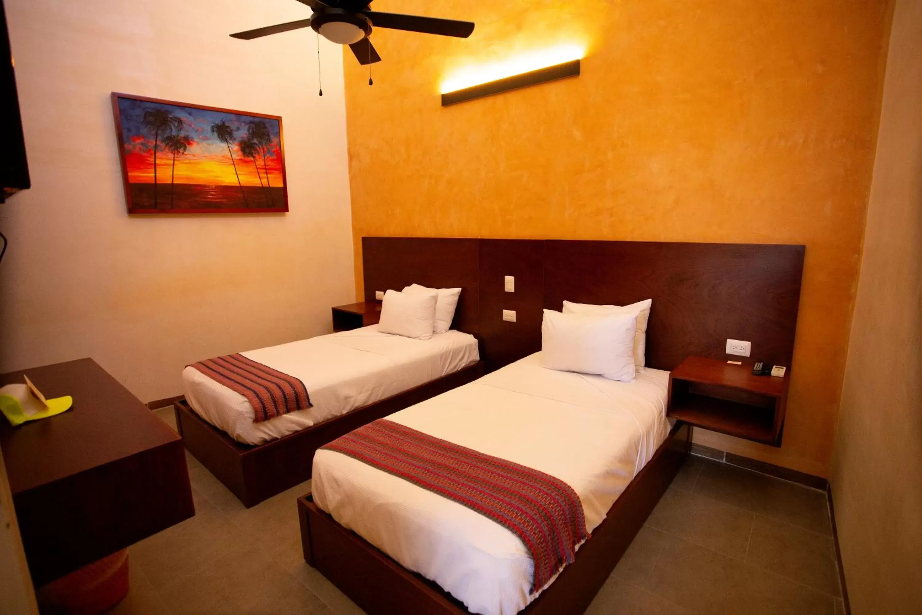 Bed in La Casona de Sisal Hotel