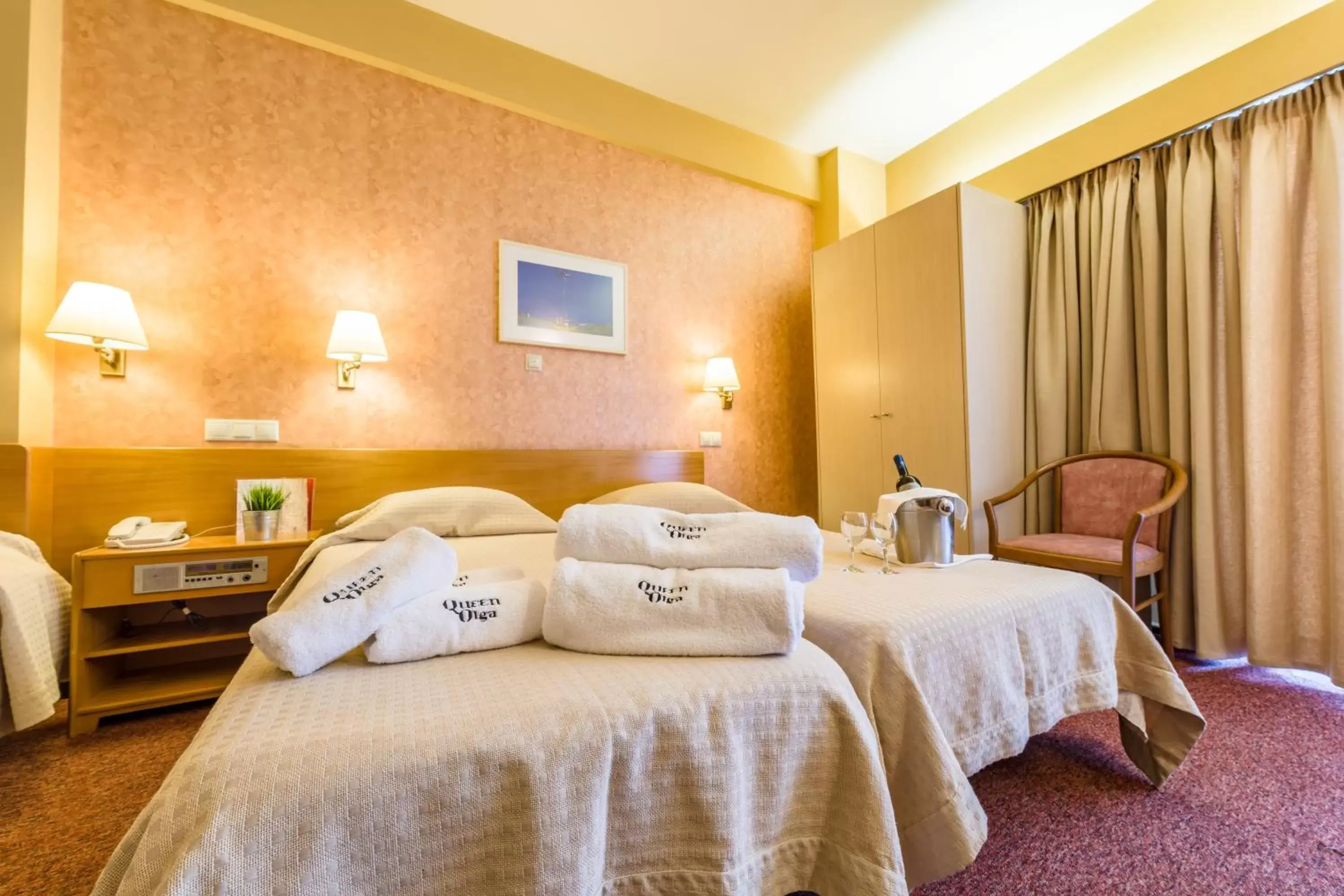 Bed in Queen Olga Hotel