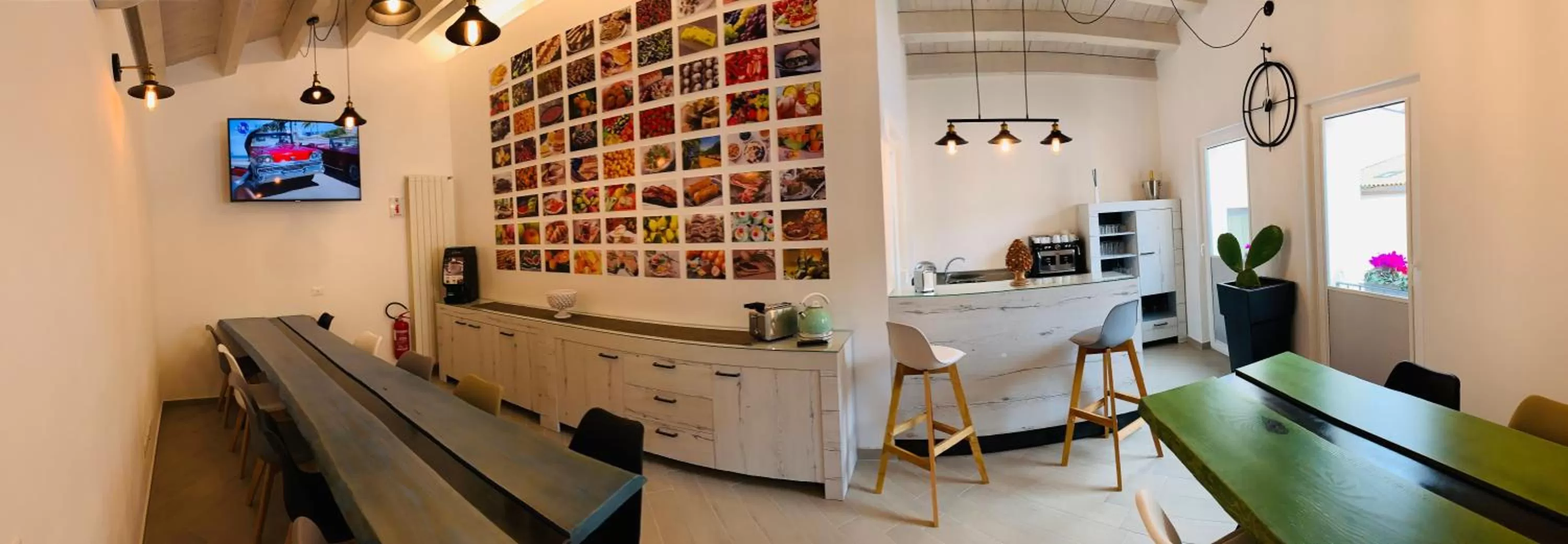 Communal lounge/ TV room in Le Maestranze Deluxe Rooms