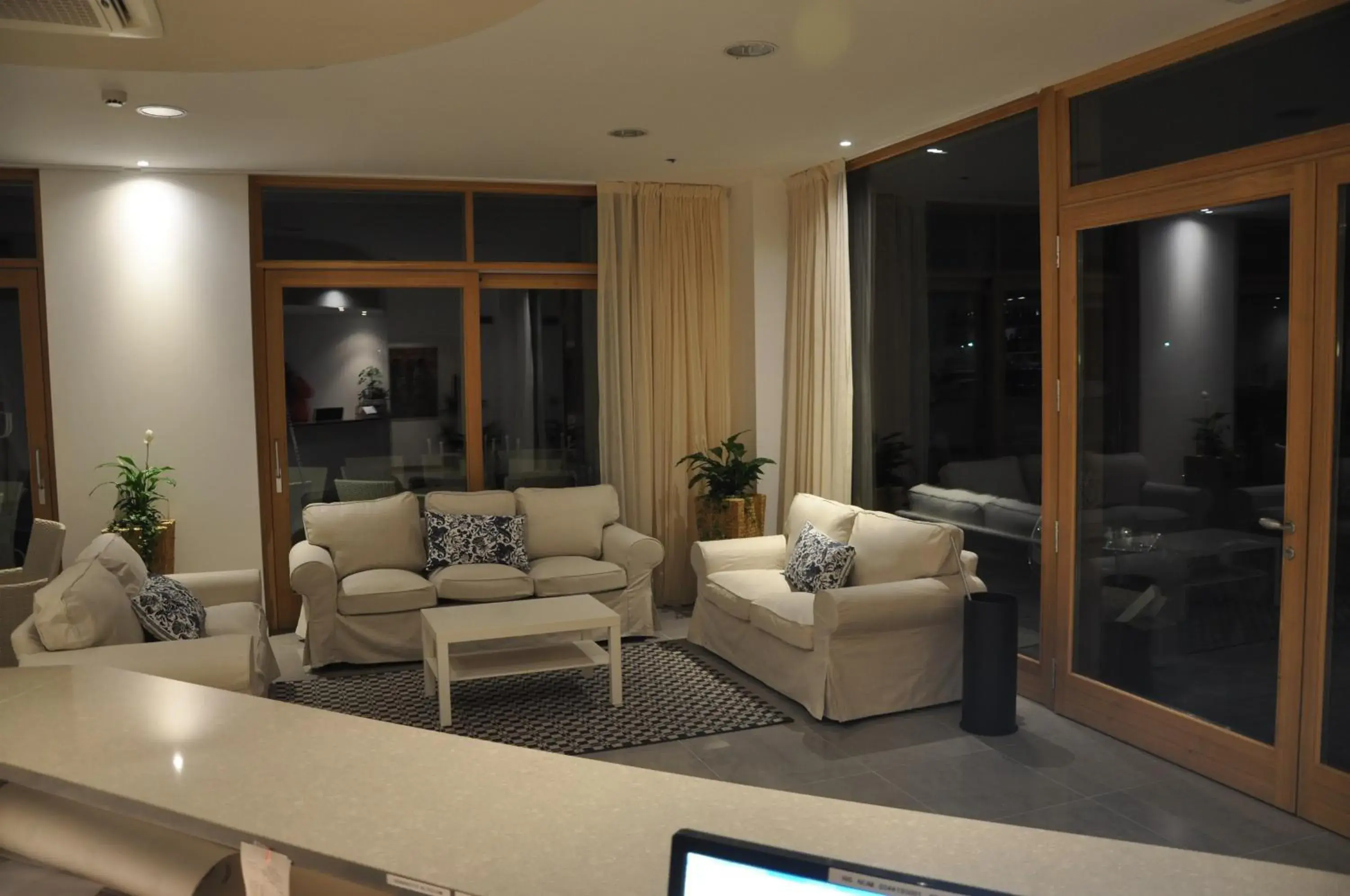Communal lounge/ TV room, Seating Area in Tullio Hotel