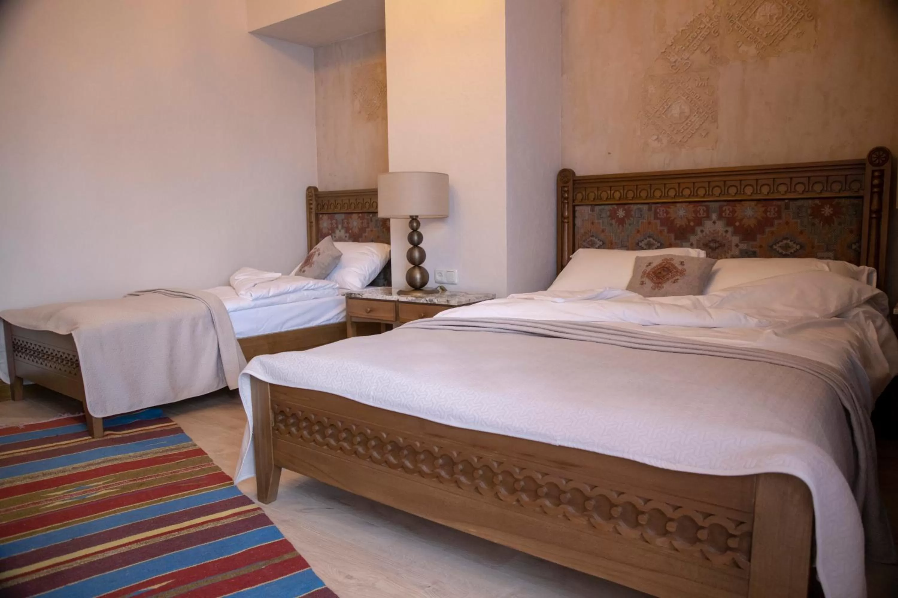 Bed in Boutique ETHNO HOTEL