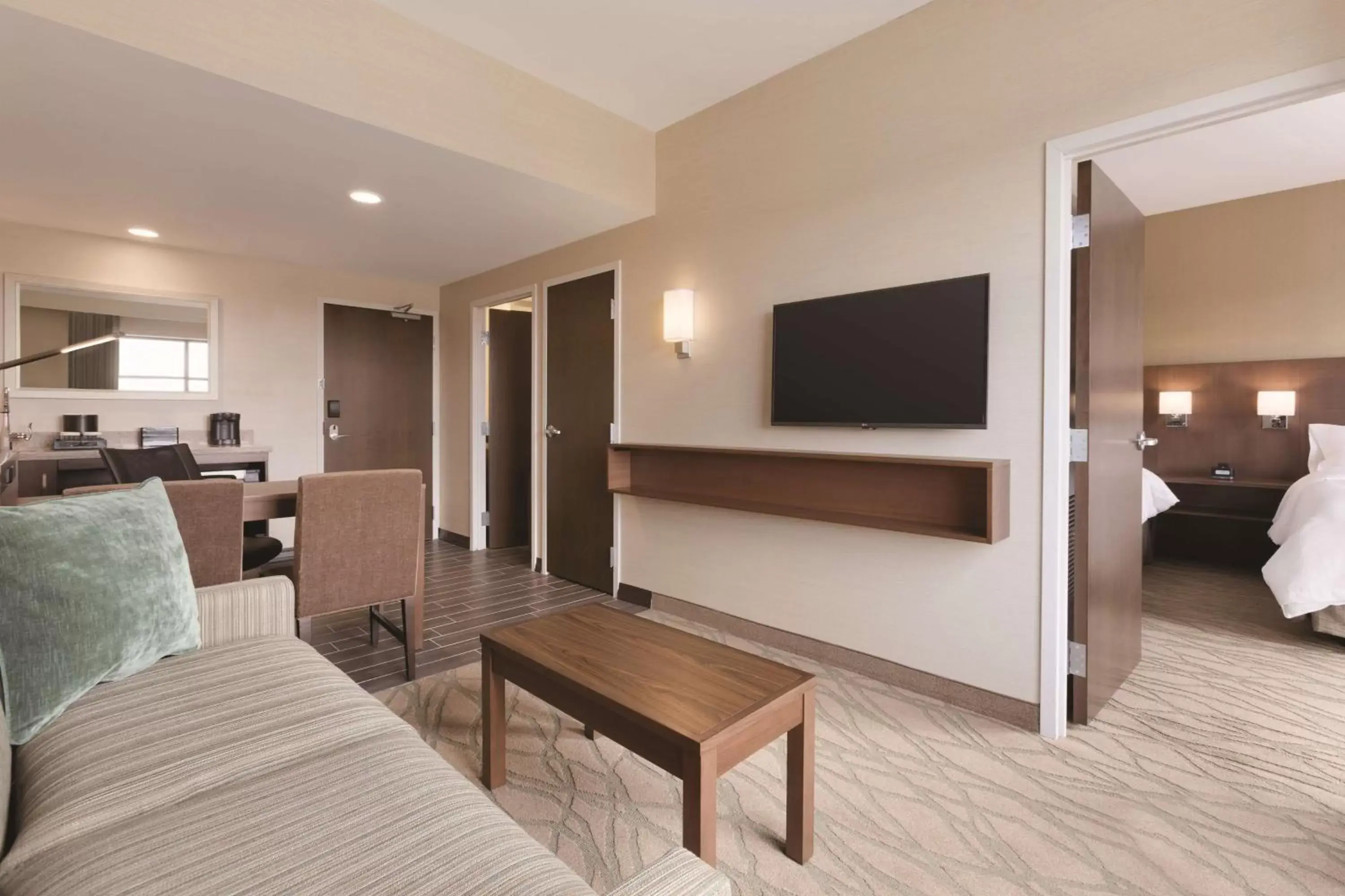 Bed, TV/Entertainment Center in Embassy Suites by Hilton Akron Canton Airport