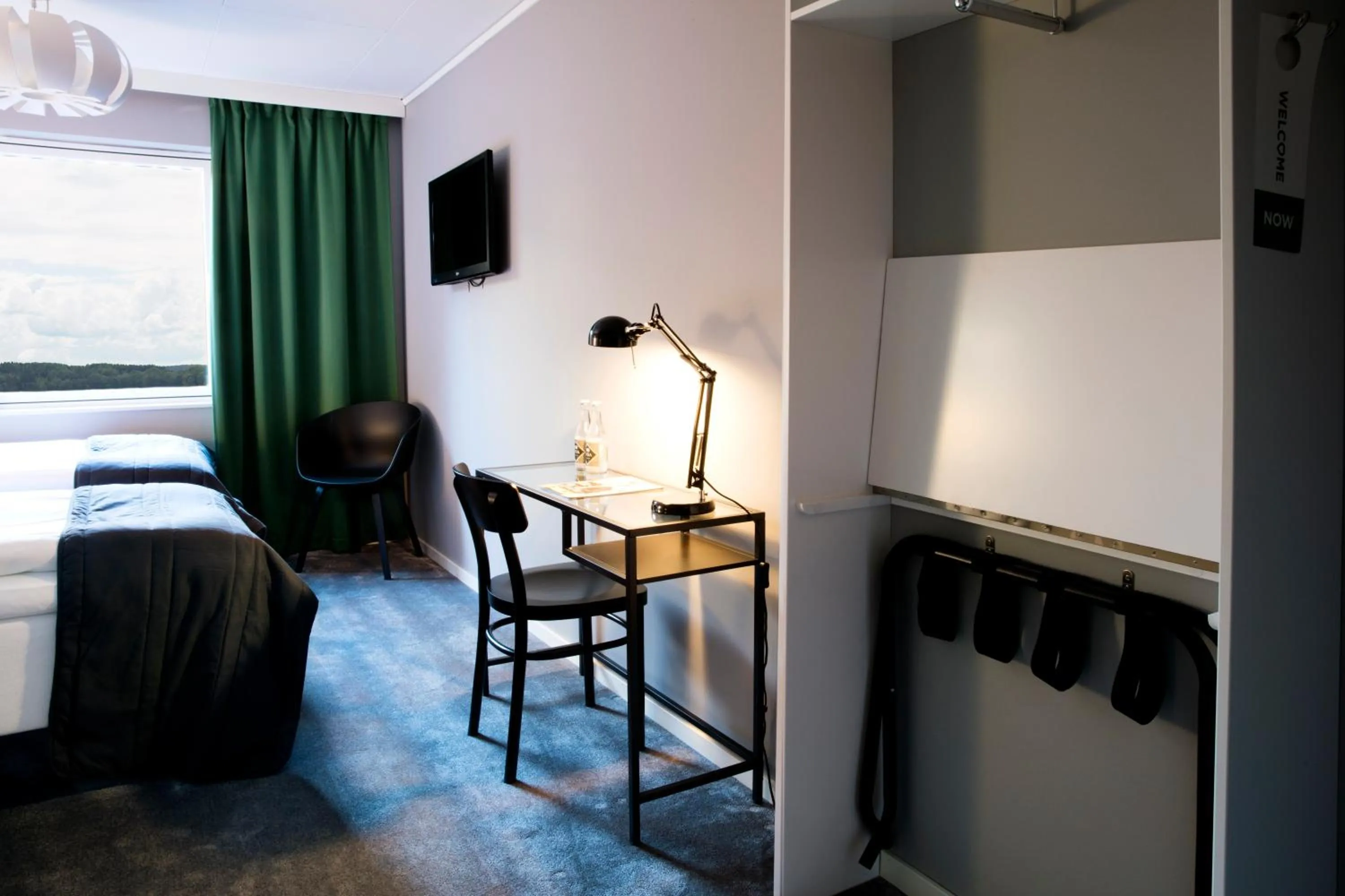 Communal lounge/ TV room in Welcome Hotel Barkarby