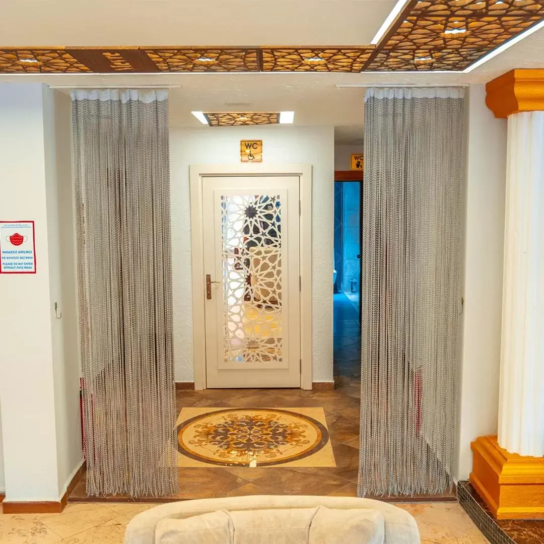 Lobby or reception, Bathroom in Mevre Hotel