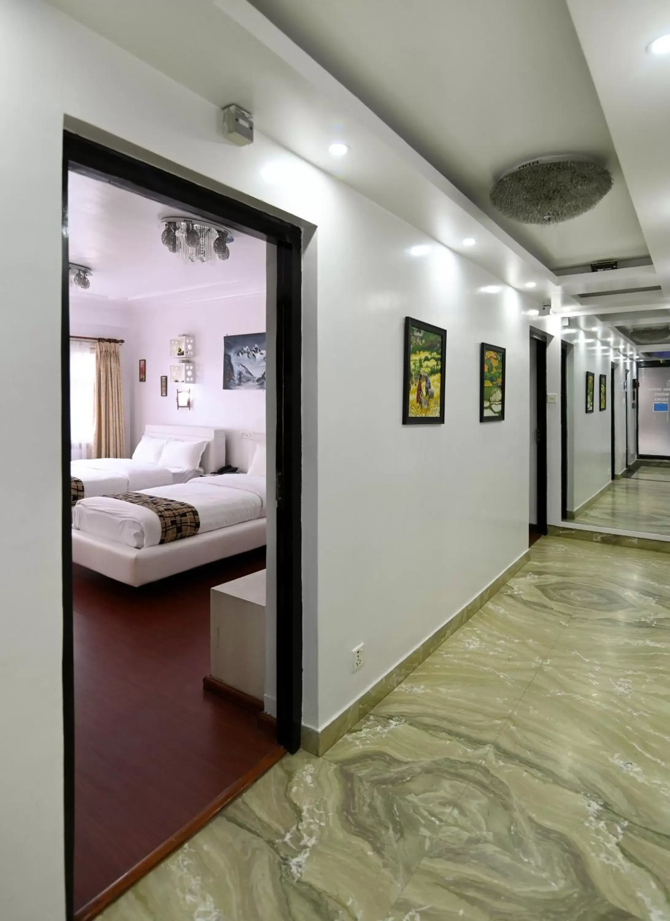 Photo of the whole room, Bed in Hotel M Square Pvt.Ltd Photo of the whole room, Bed in Hotel M Square Pvt.Ltd