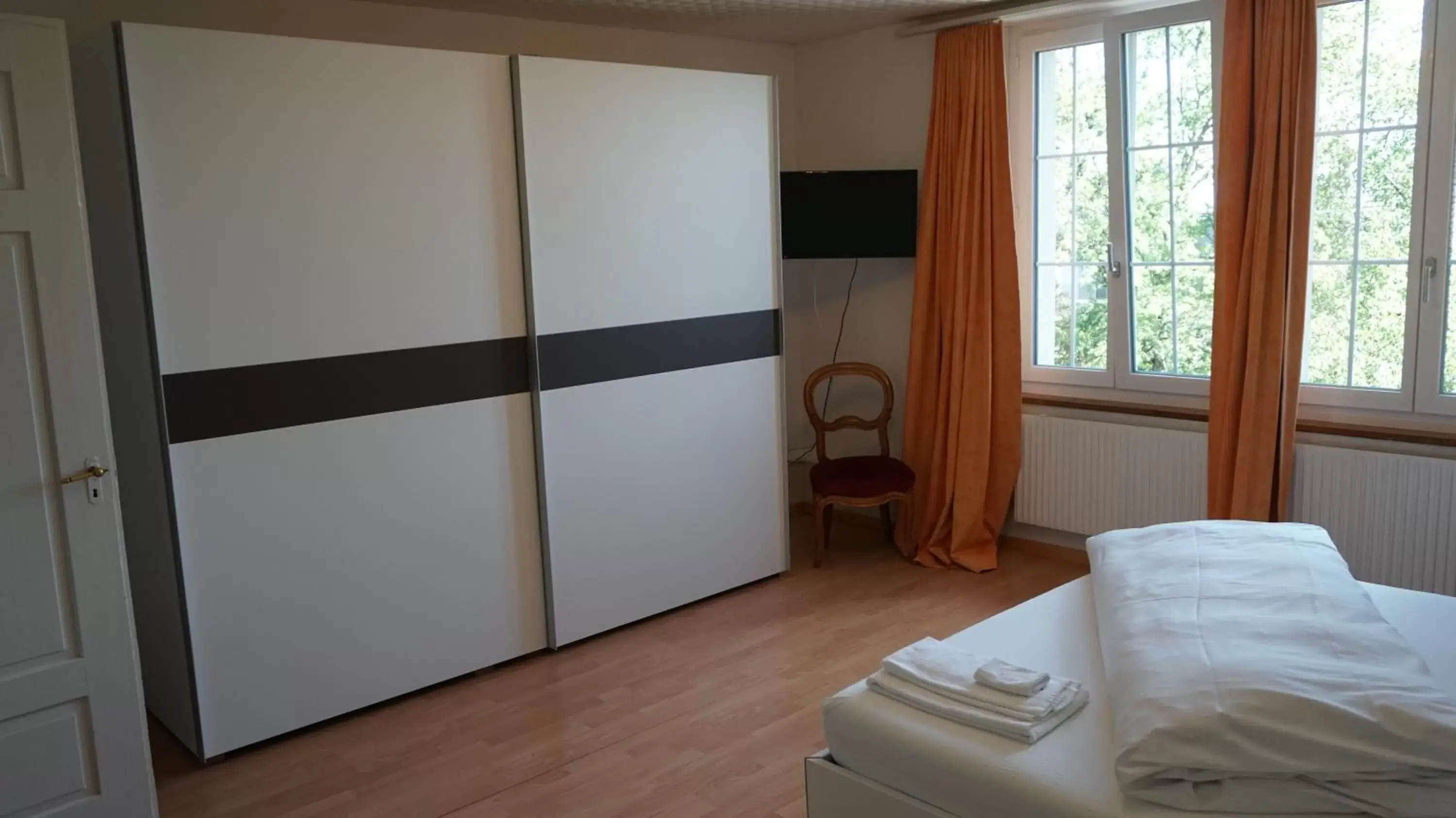 Bedroom, TV/Entertainment Center in Gasthof National