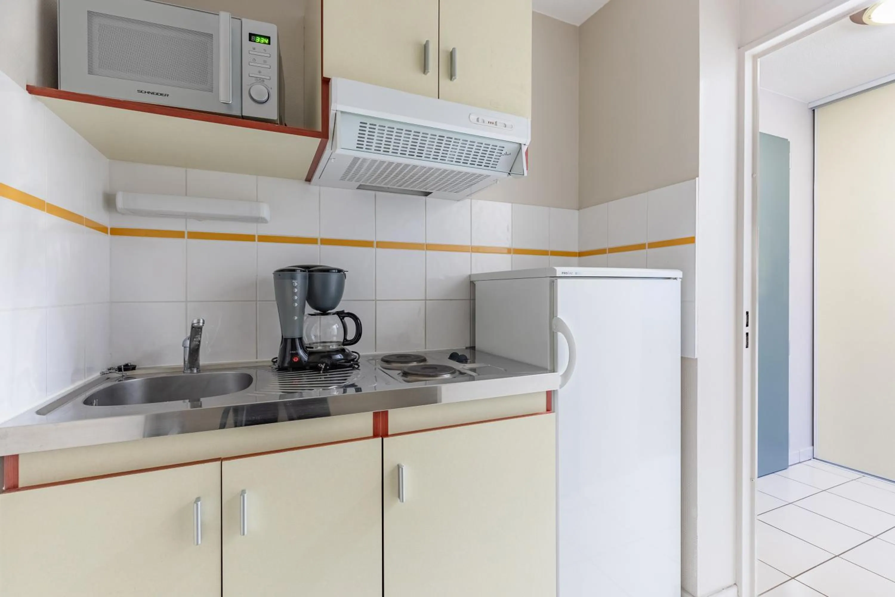 Kitchen or kitchenette in Appart'City Classic Limoges