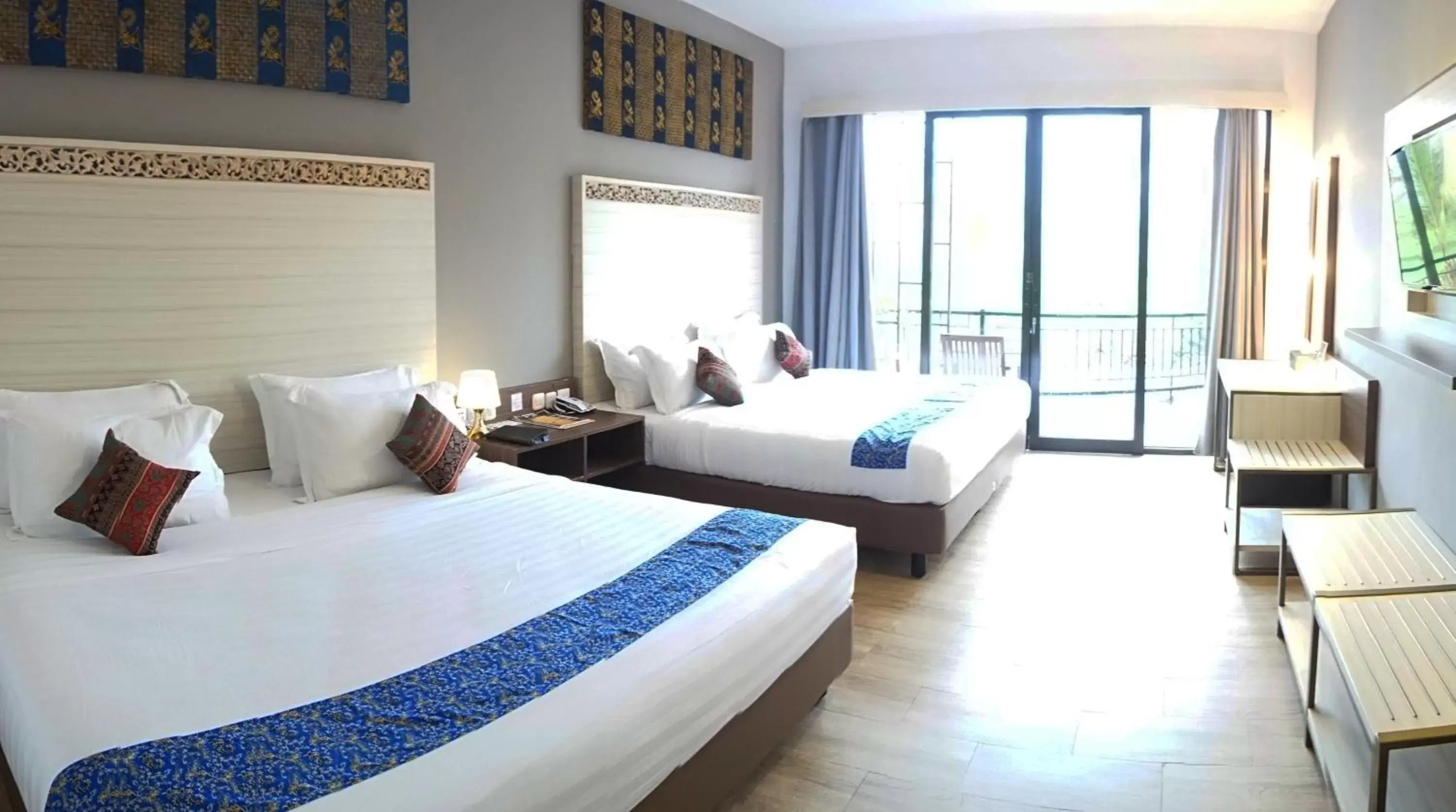 Bed in Grand Harvest Resort & Villas