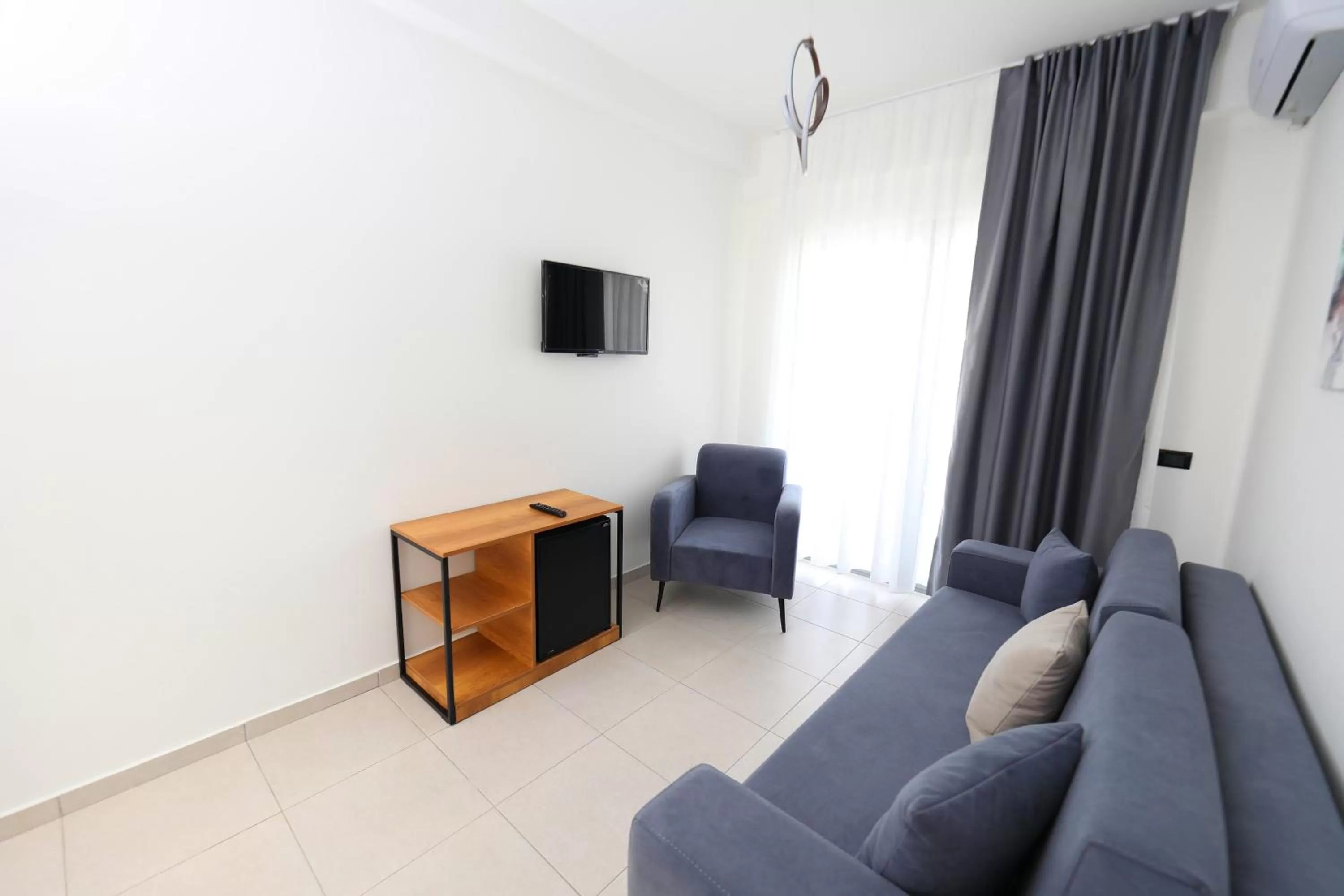 Communal lounge/ TV room in Maor Hotel