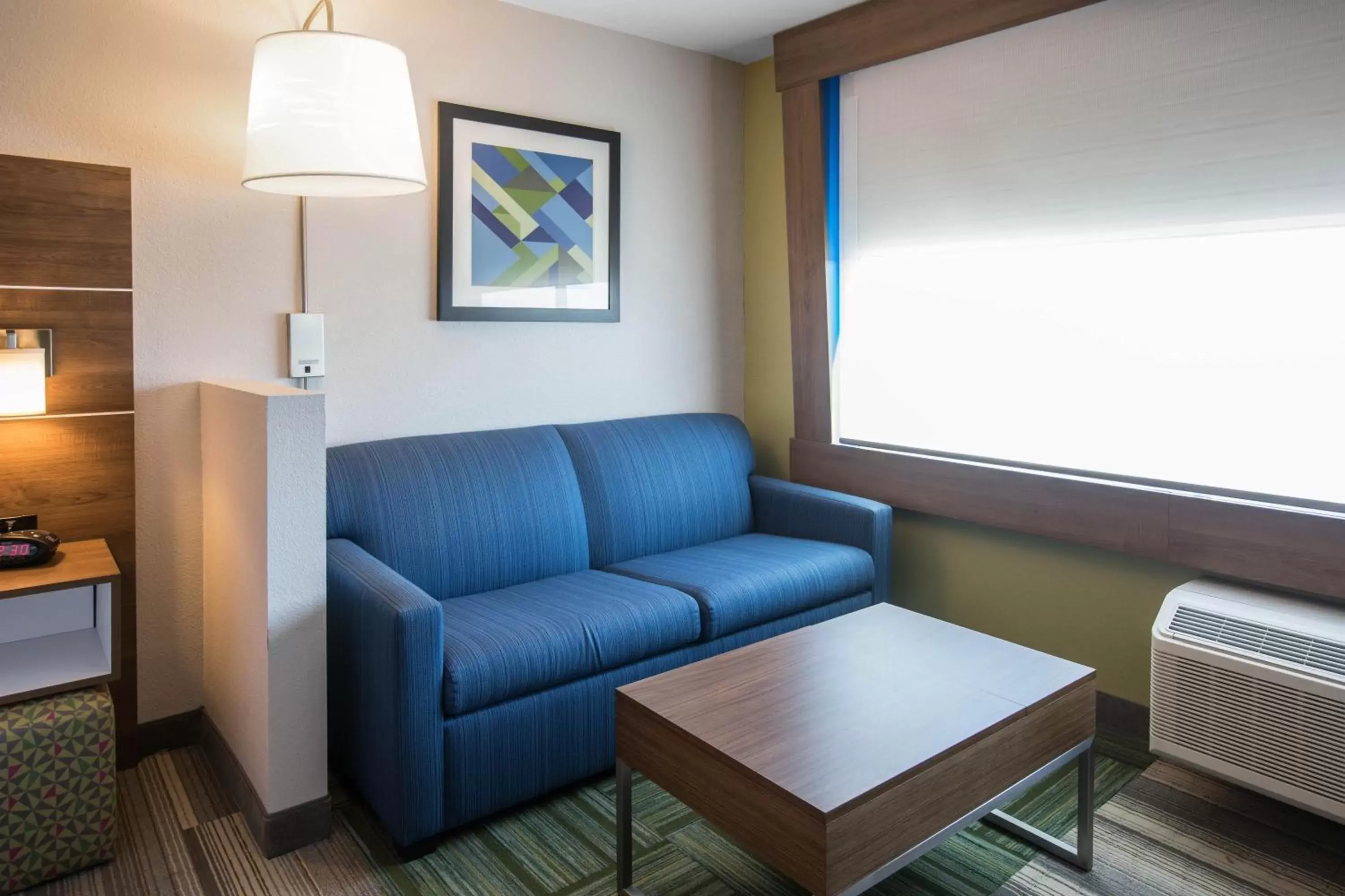 Bedroom, Seating Area in Holiday Inn Express & Suites Ludington, an IHG Hotel