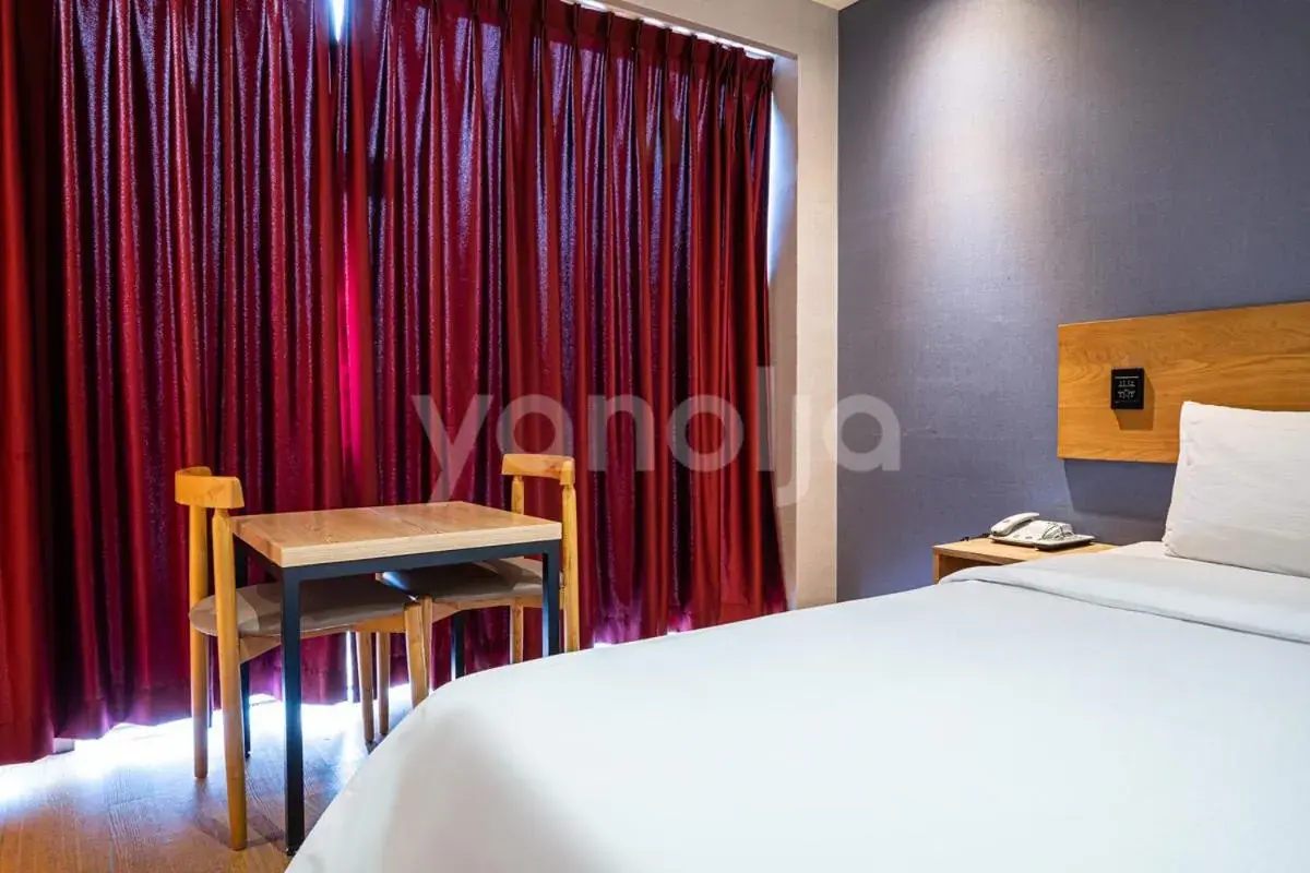 Bed in La Villa Hotel Bed in La Villa Hotel