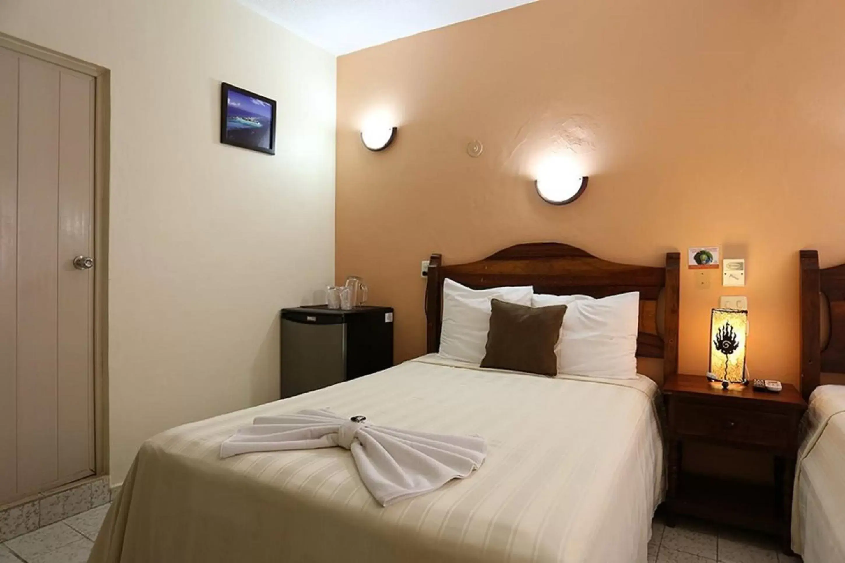 Bed in Hotel Bucaneros Isla Mujeres