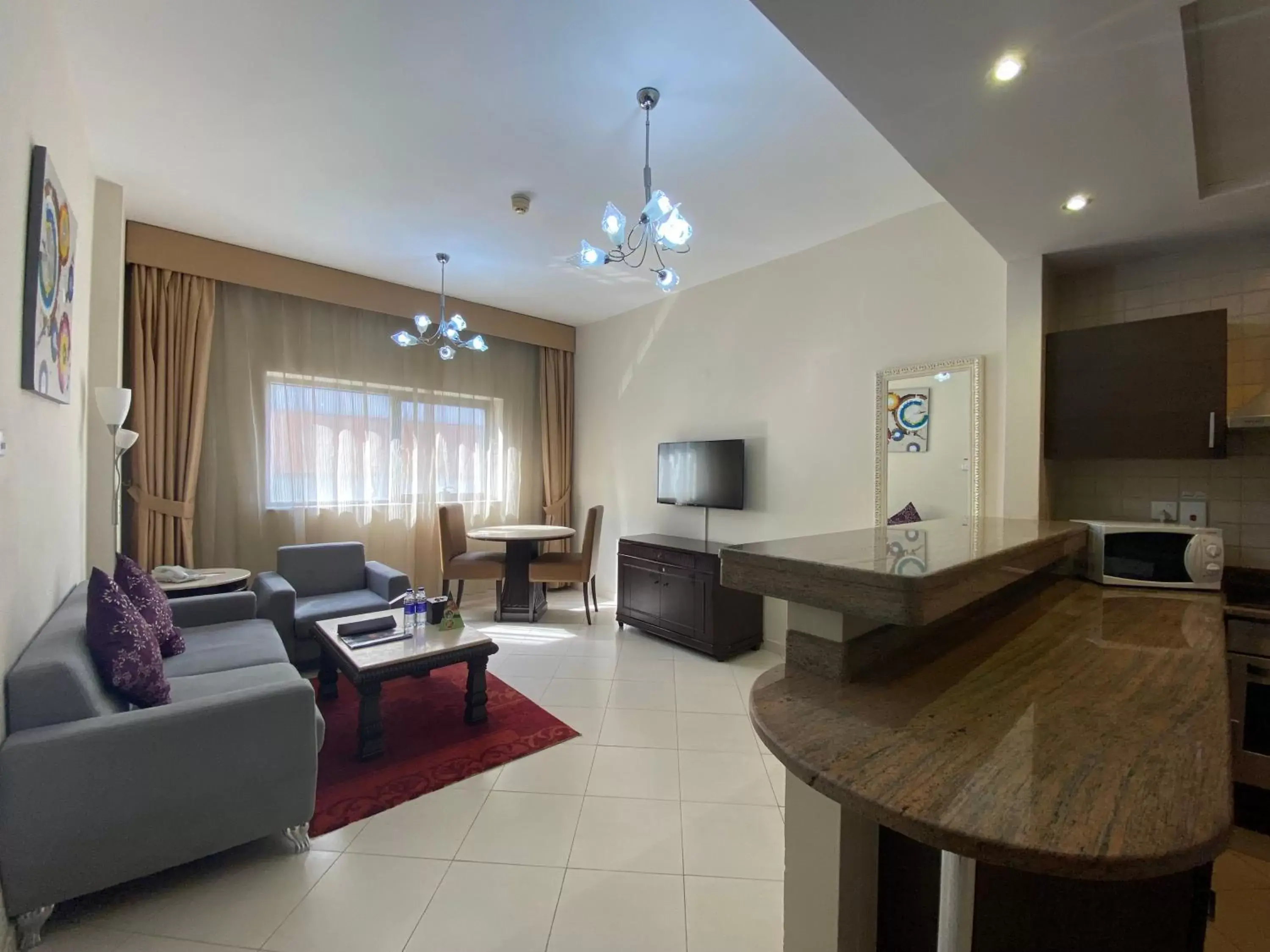 Kitchen or kitchenette, Seating Area in Auris Boutique Hotel Apartments - AlBarsha