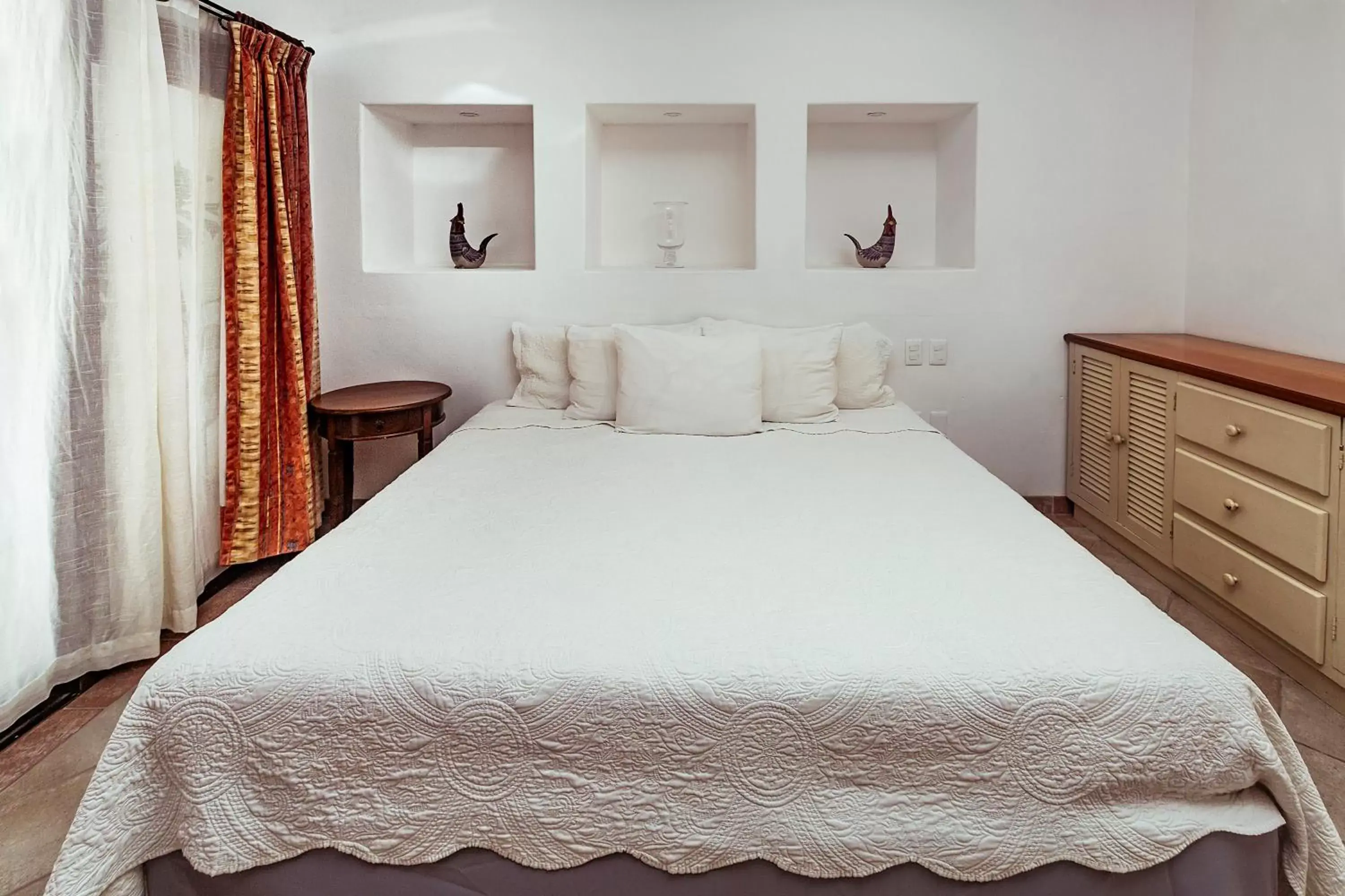 Bed in Fabiola Condo Hotel