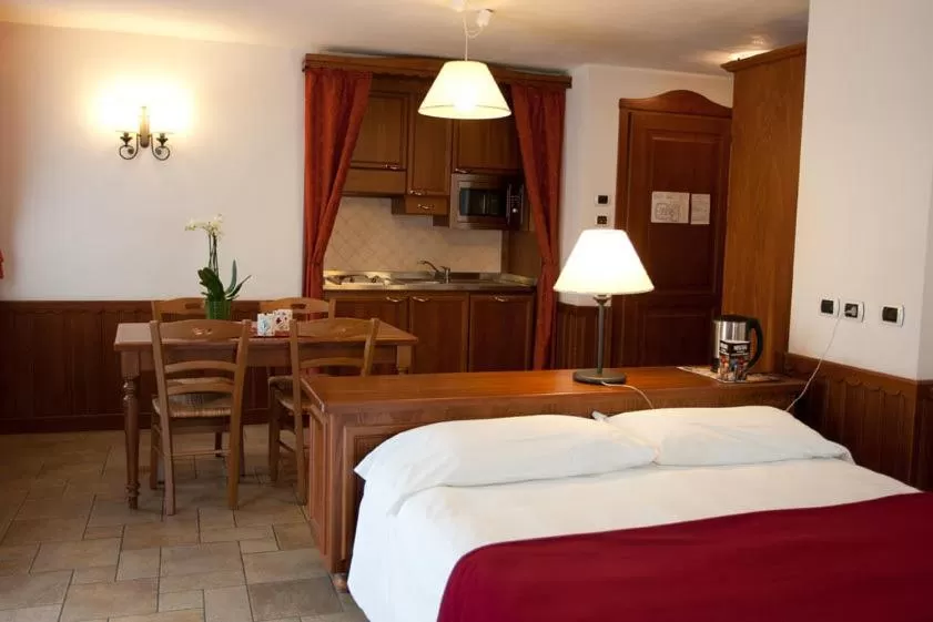 Kitchen or kitchenette, Bed in Residence Le Grand Chalet