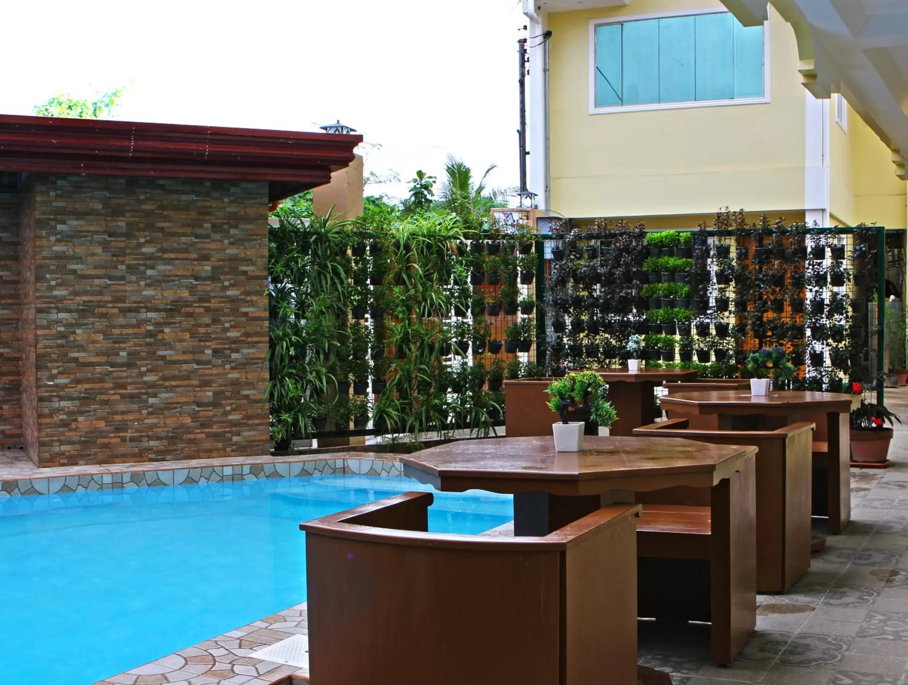 Property building, Swimming Pool in Laciaville Resort and Hotel