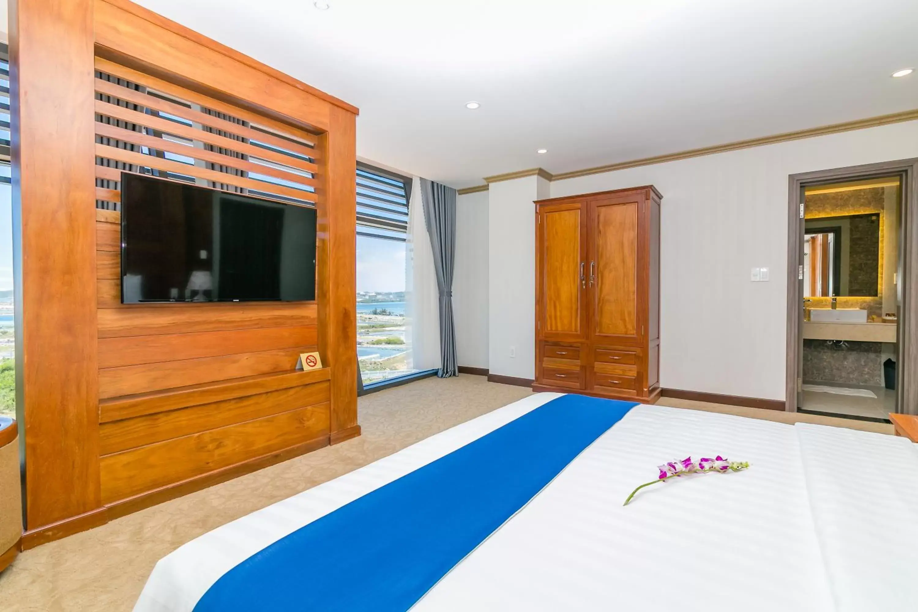 Communal lounge/ TV room, Bed in Navy Hotel Cam Ranh Communal lounge/ TV room, Bed in Navy Hotel Cam Ranh