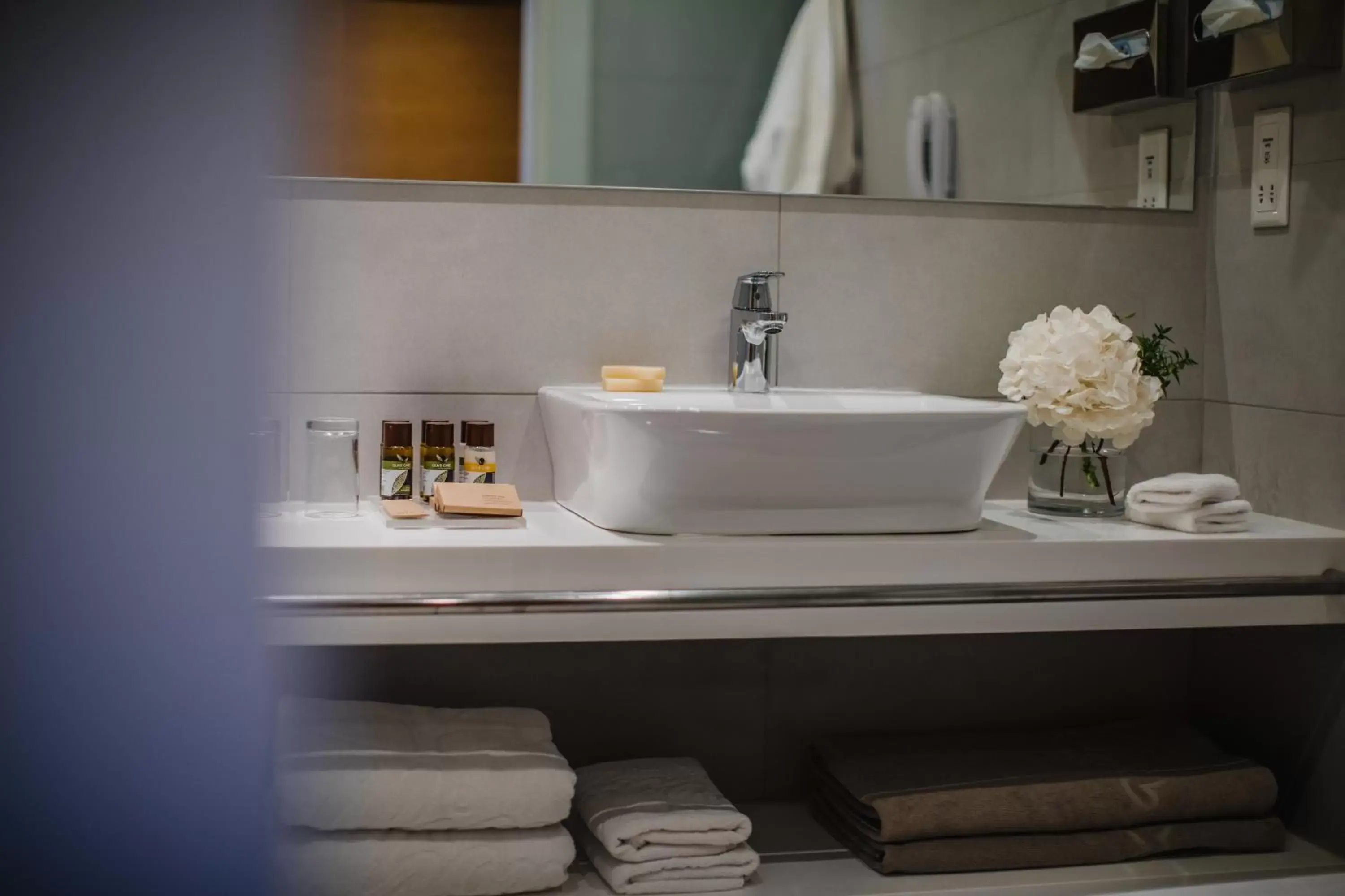 Bathroom in Alion Beach Hotel