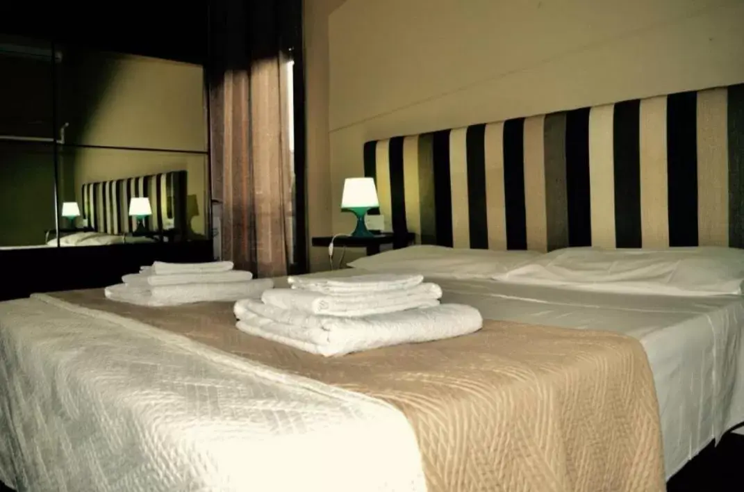 Bed in Battisti Rooms & Breakfast