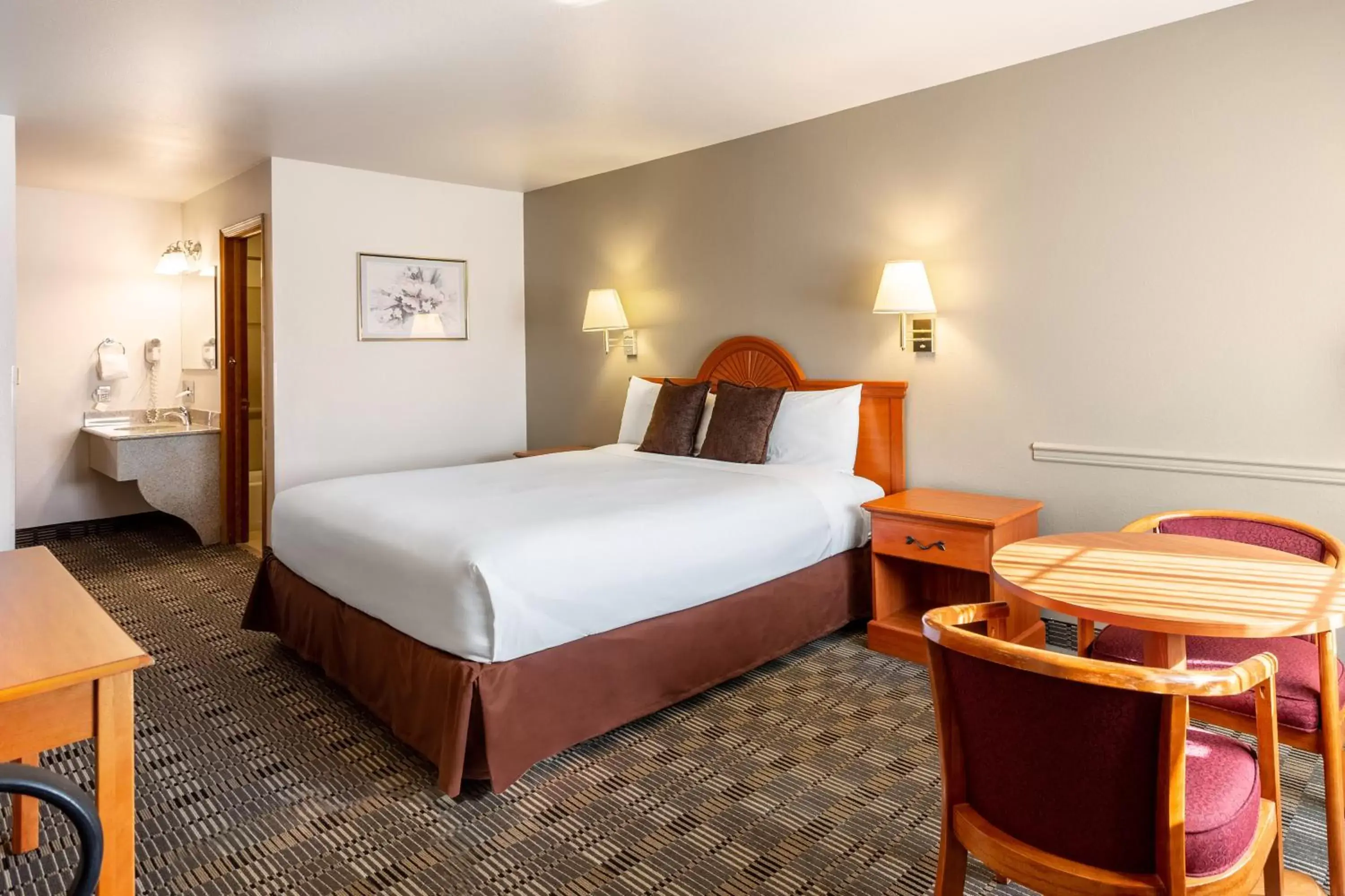 Bed in Americas Best Value Inn Burns Bed in Americas Best Value Inn Burns