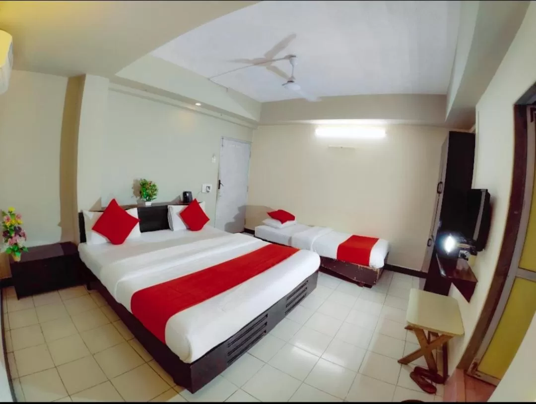 Bed in HOTEL HARMONY