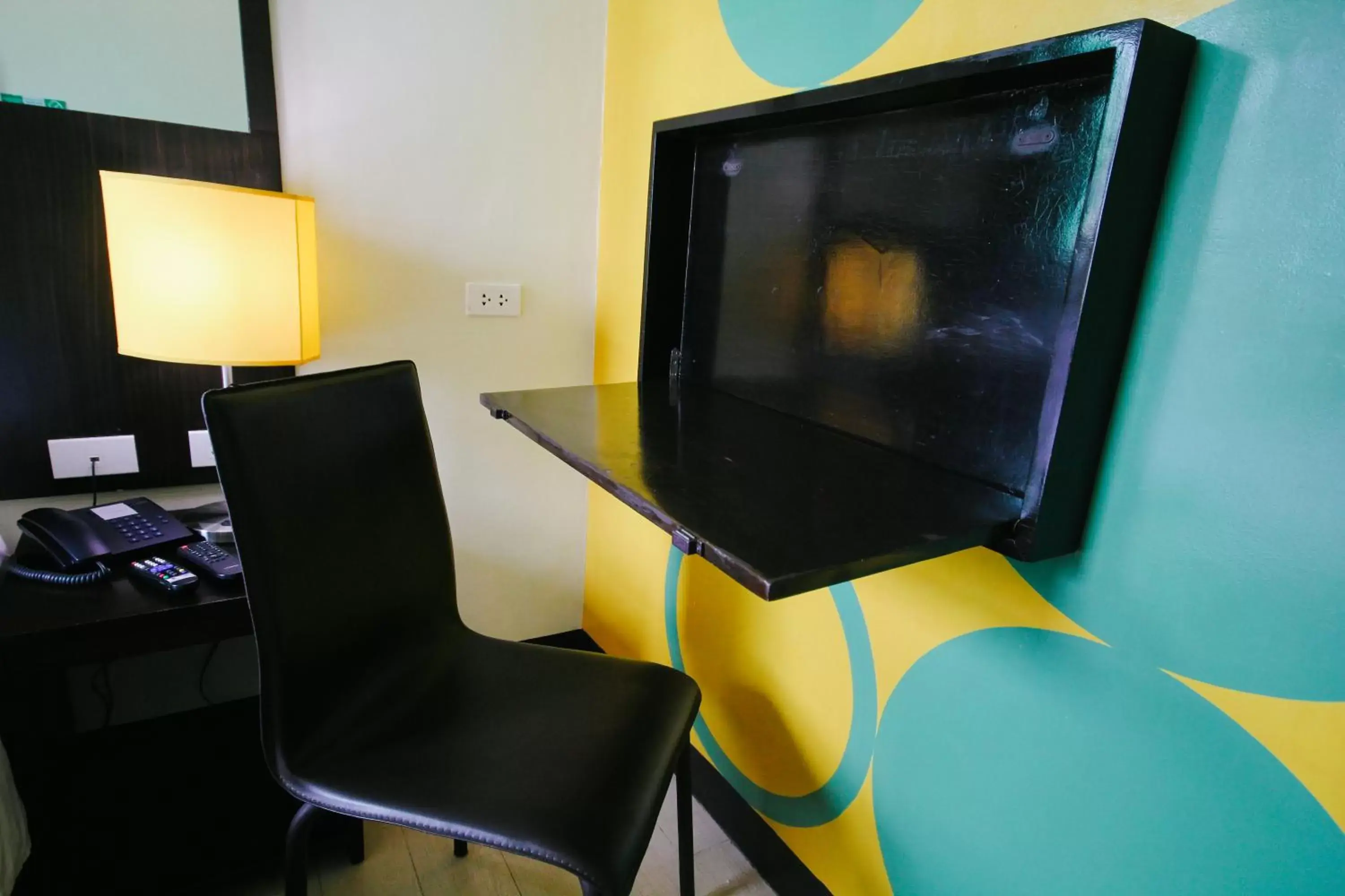Seating area, TV/Entertainment Center in Go Hotels Dumaguete