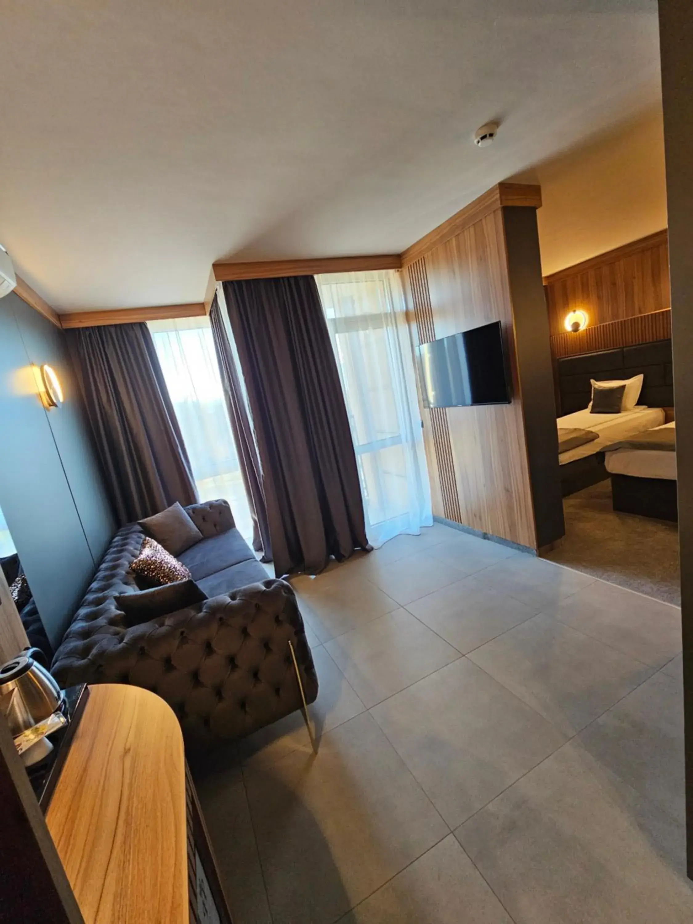 Communal lounge/ TV room, Bed in Park Hotel Plovdiv