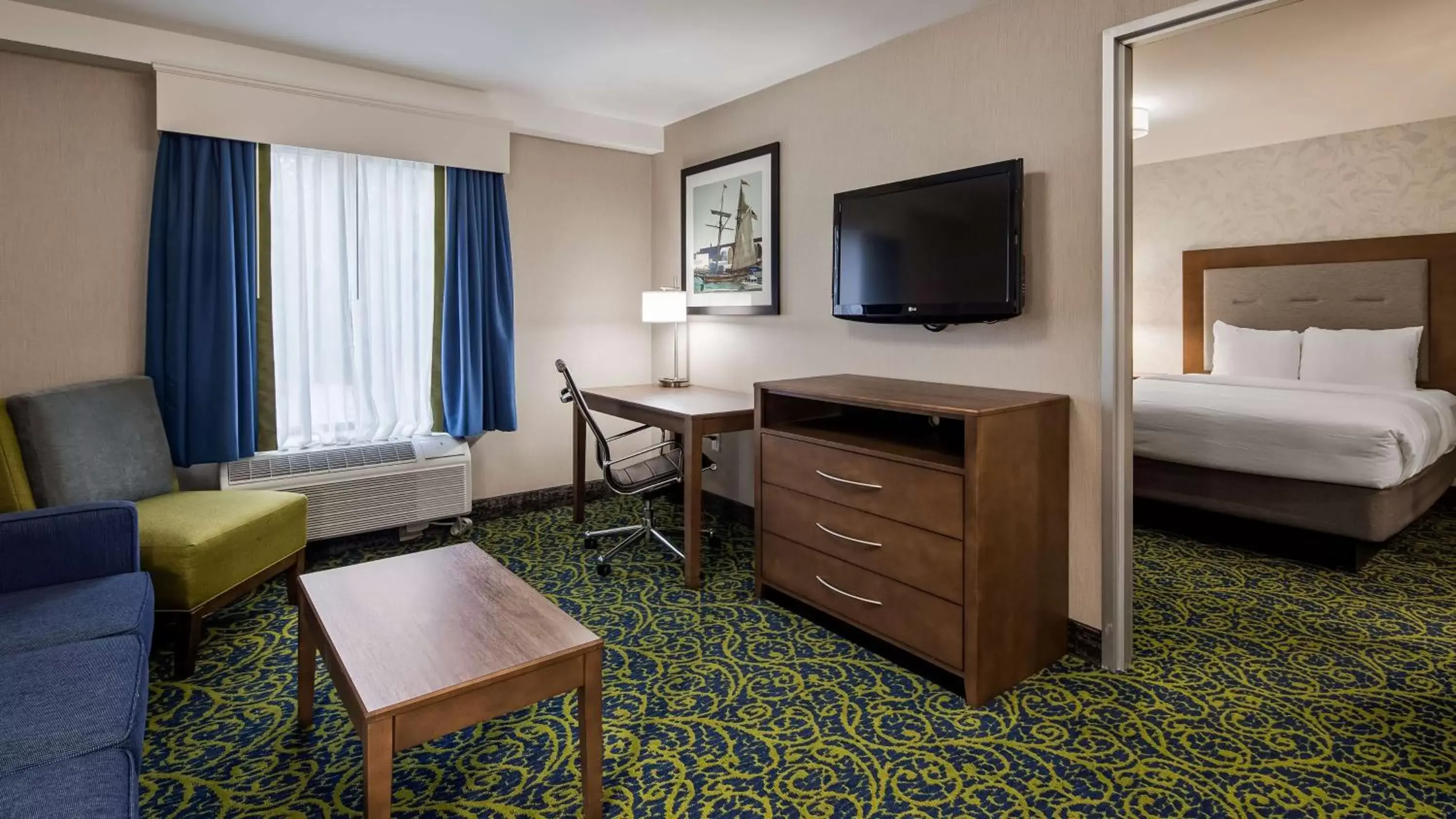 Photo of the whole room, TV/Entertainment Center in Best Western Plus Portsmouth Hotel & Suites