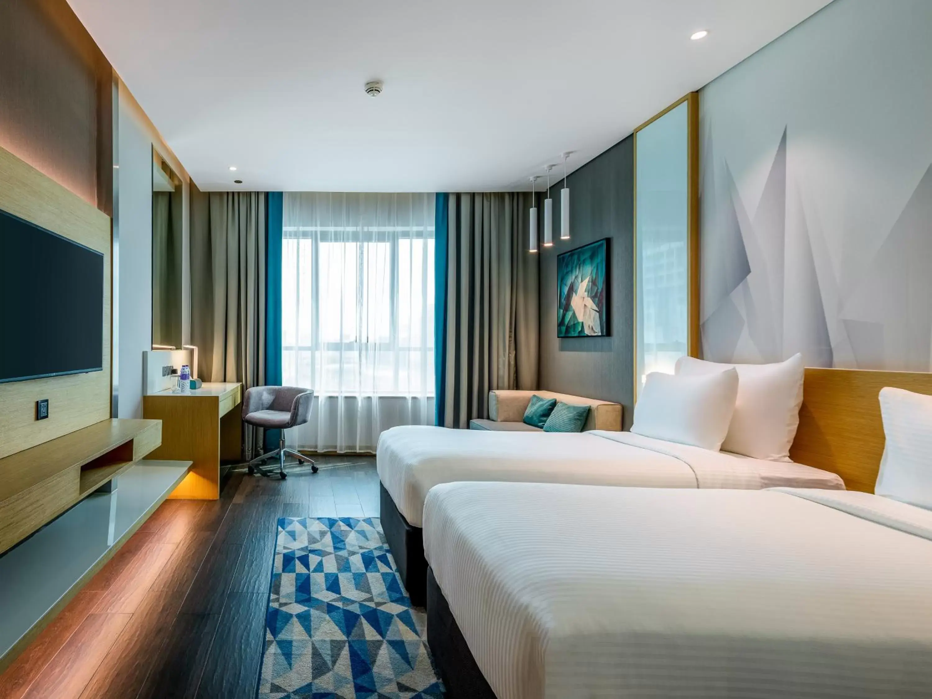 Bed in Flora Inn Hotel Dubai Airport