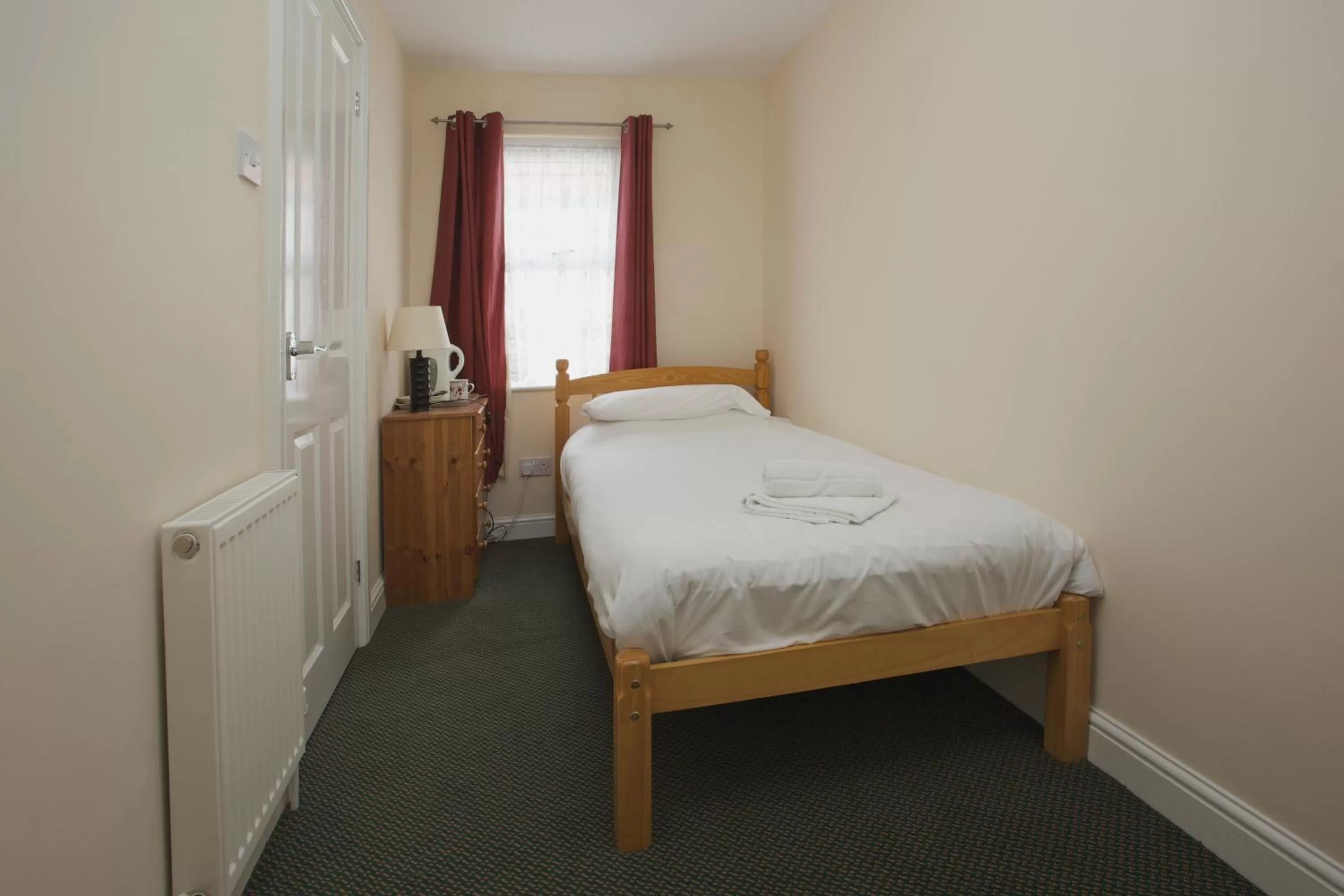 Bedroom in All Seasons Lodge Hotel