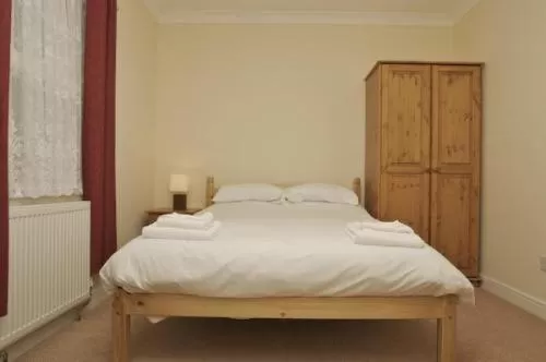 Bedroom in All Seasons Lodge Hotel