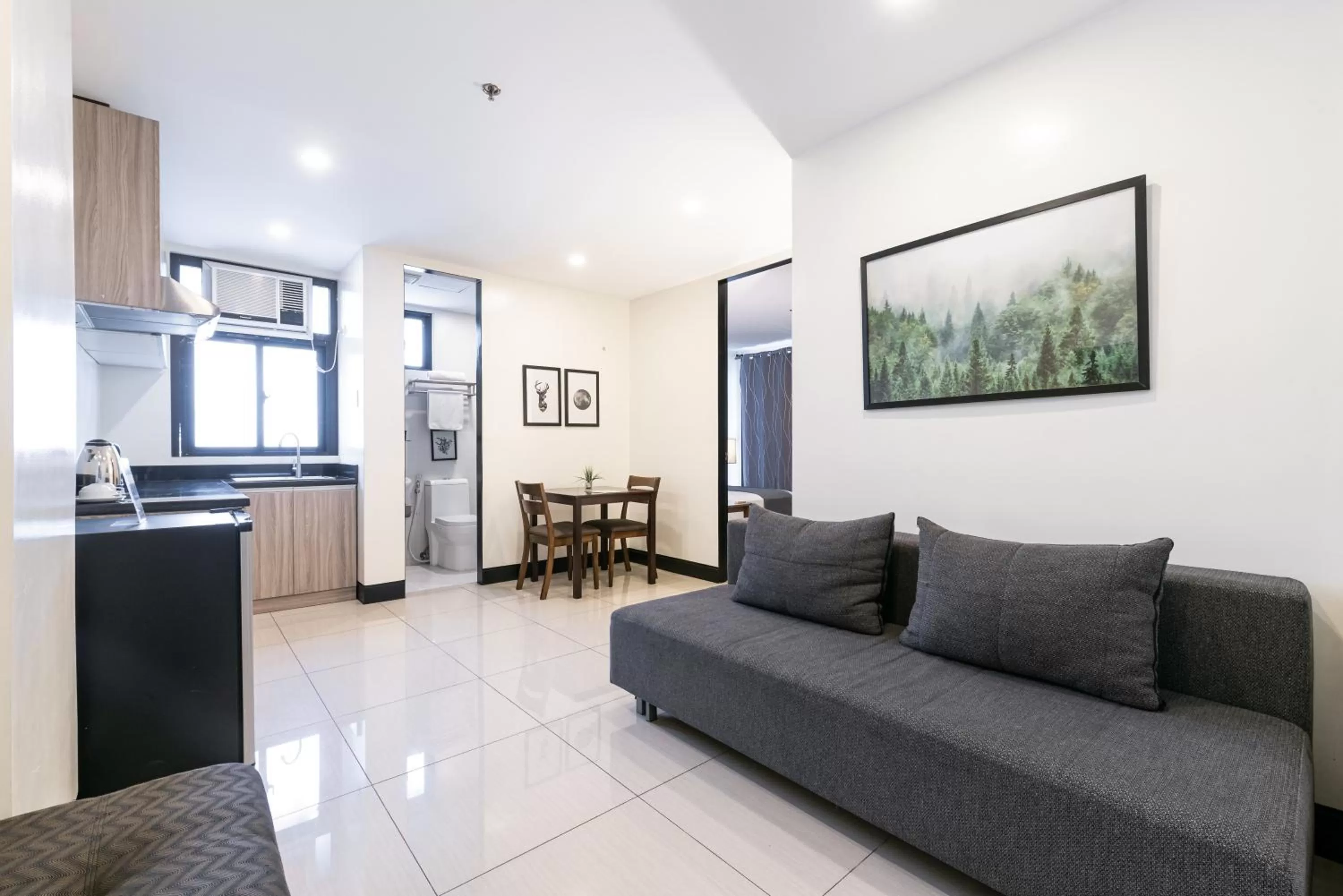 Living room in Artemis Place Makati Hotel