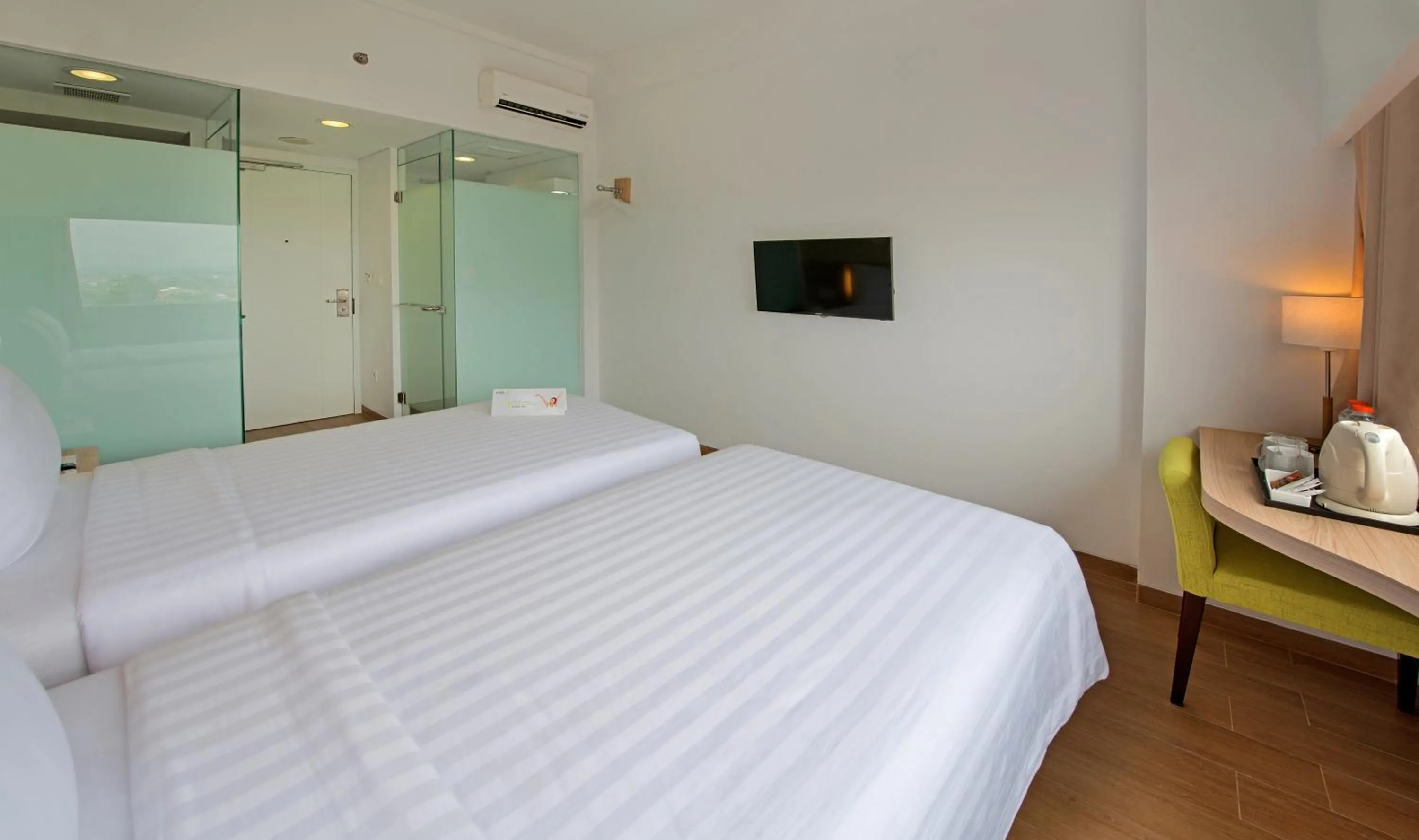 Bed in Whiz Prime Hotel Pajajaran Bogor