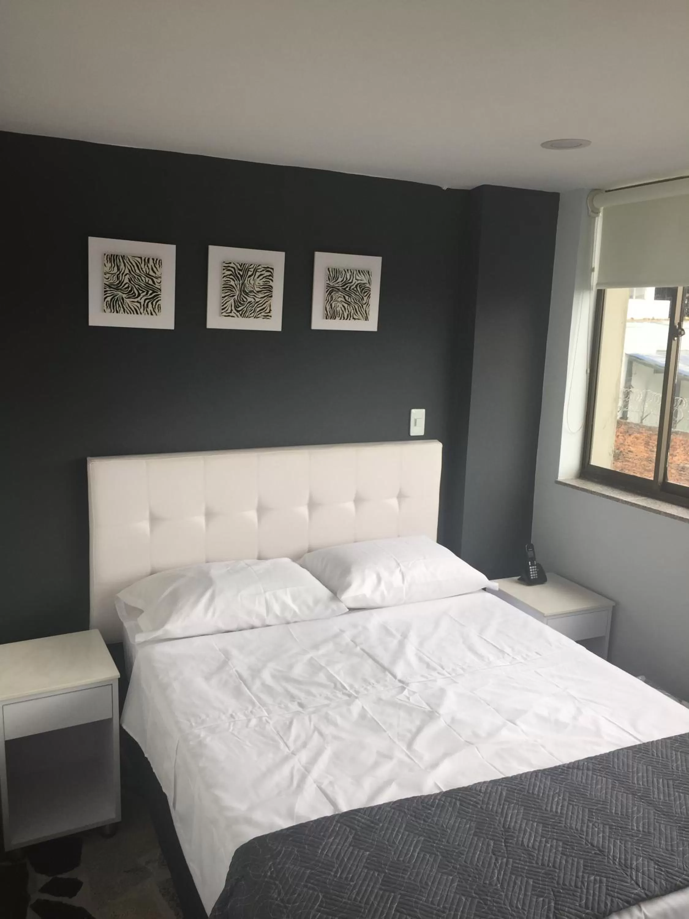 Bed in Hotel Garden City Boutique