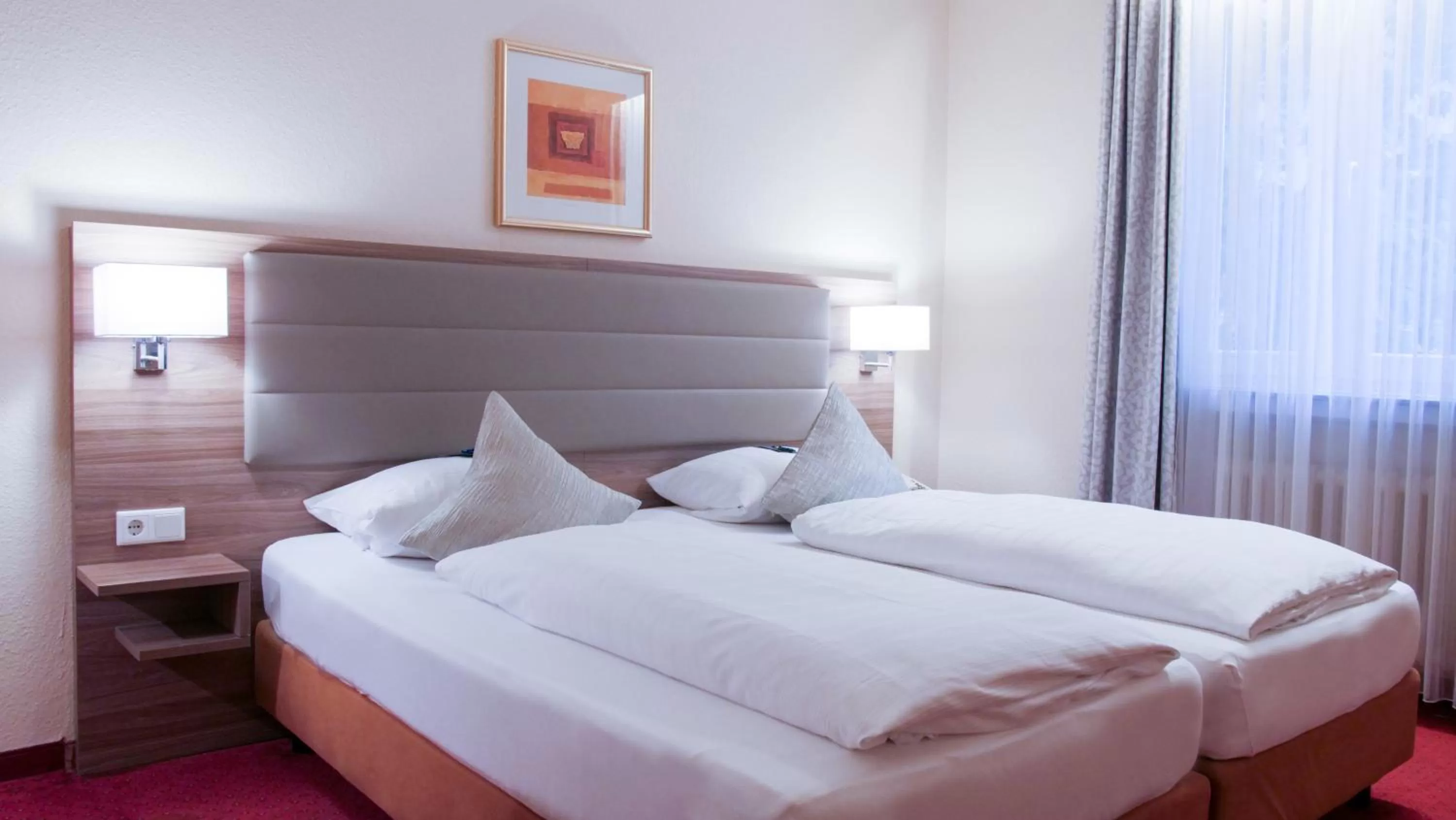 Photo of the whole room, Bed in Comfort Garni Stadtzentrum Hotel