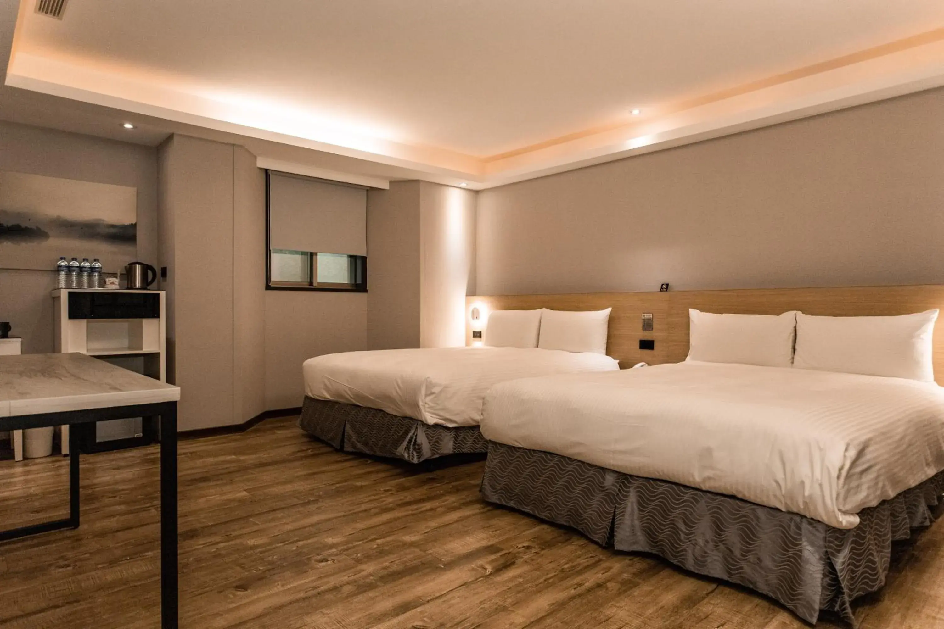 Bed in Hub Hotel Tucheng