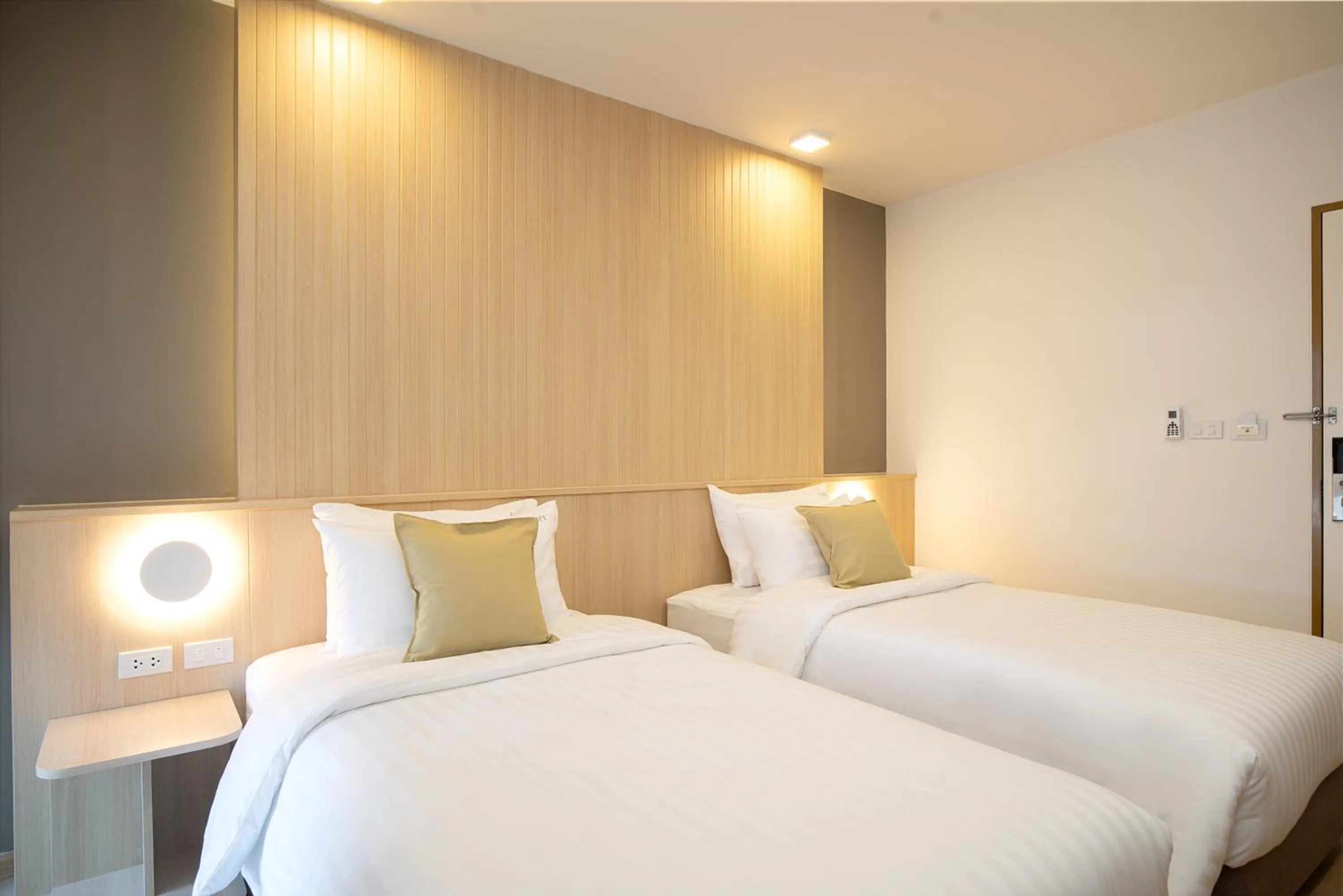 Bed in Diya Hotel Bangkok