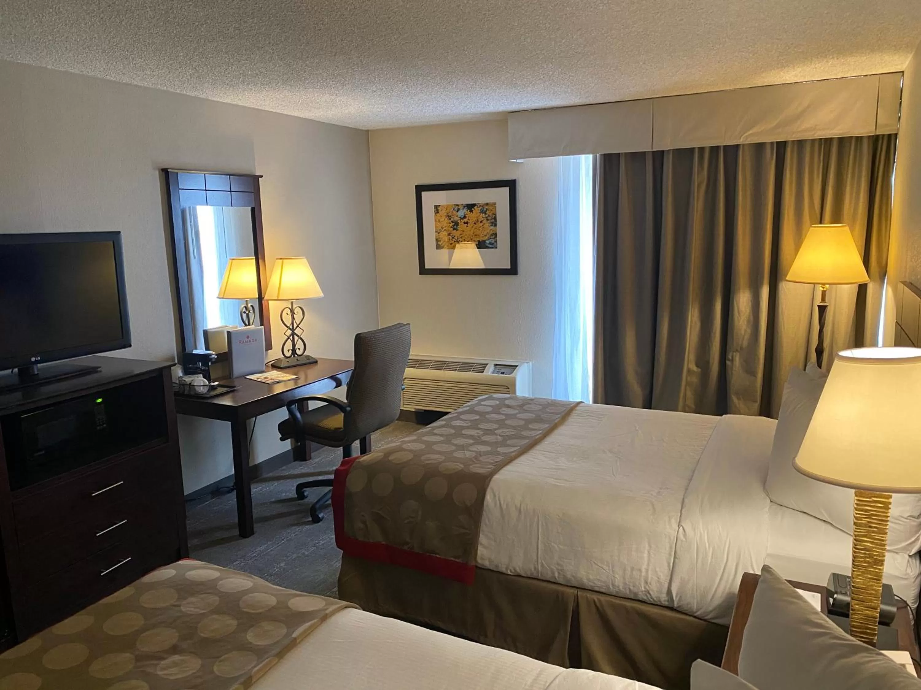 Bed in Ramada by Wyndham Albuquerque Midtown