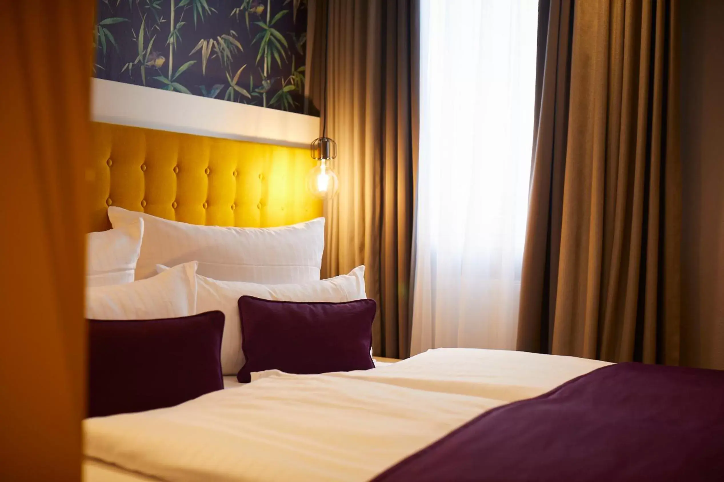 Bed in Hotel Mirabell by Maier Privathotels