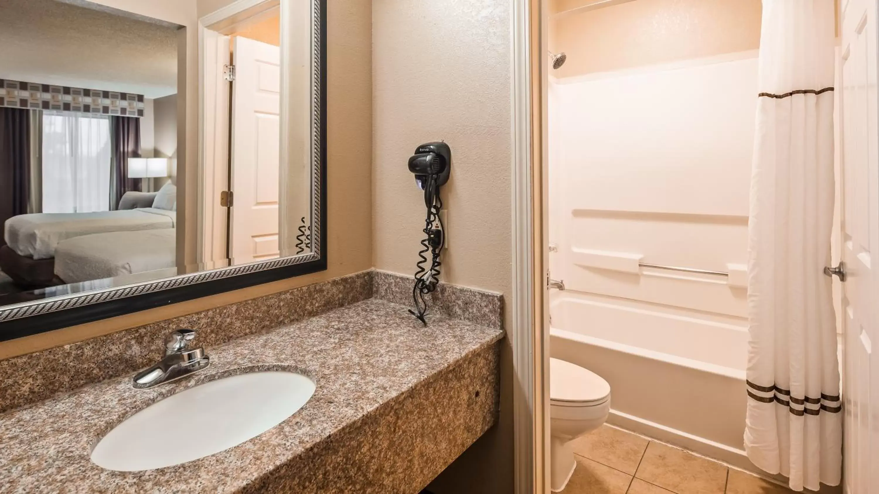 Bathroom in SureStay Plus Hotel by Best Western Jackson