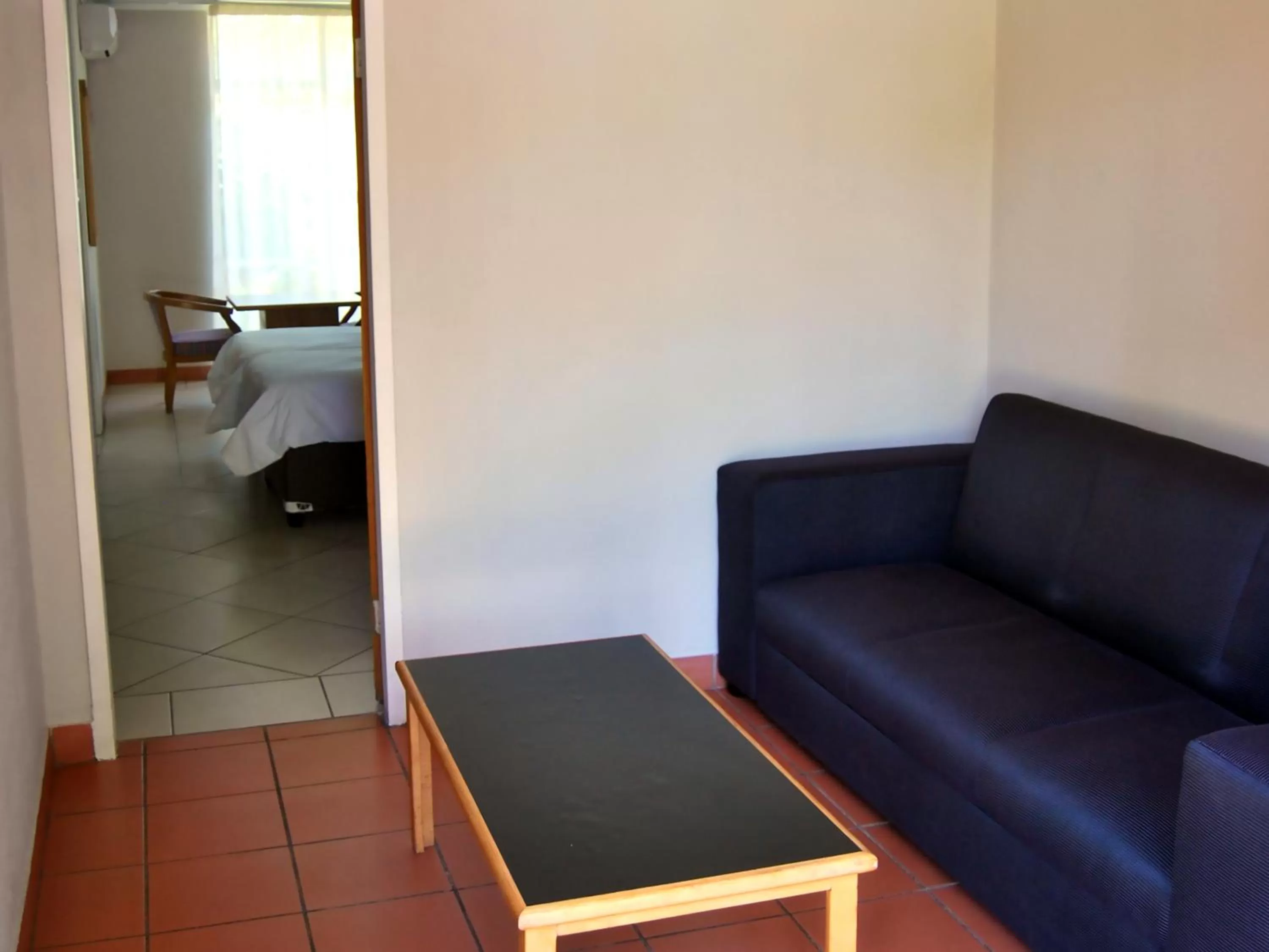 Bed in Safari Hotel & Convention Centre