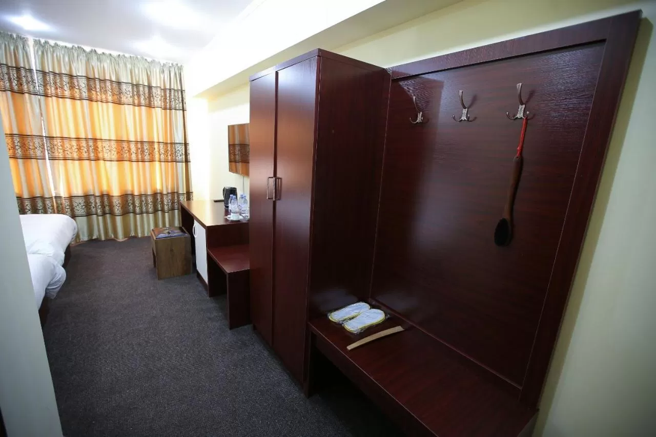 Bed in Altai Business Hotel