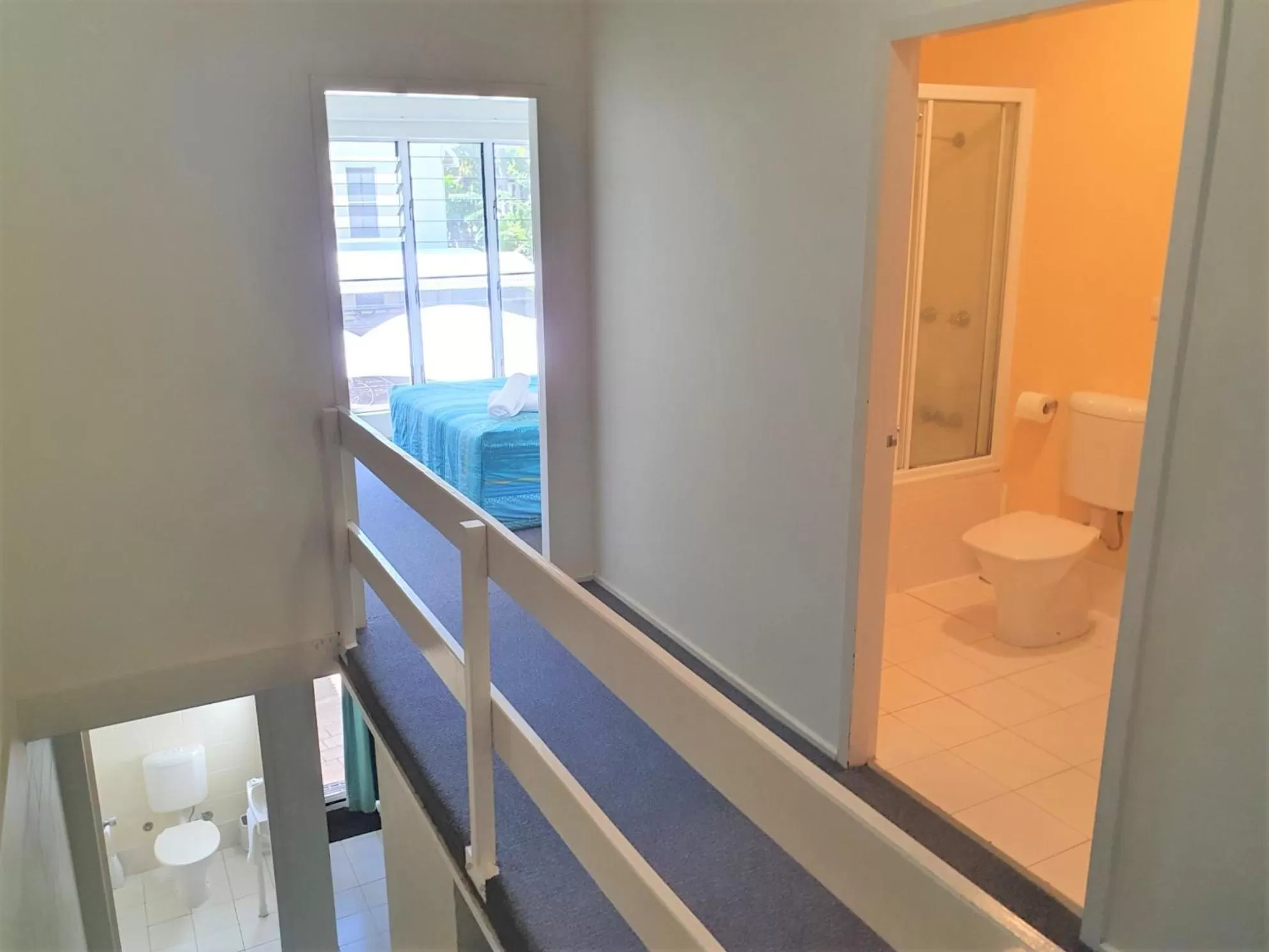 Toilet in Mango Tree Holiday Apartments