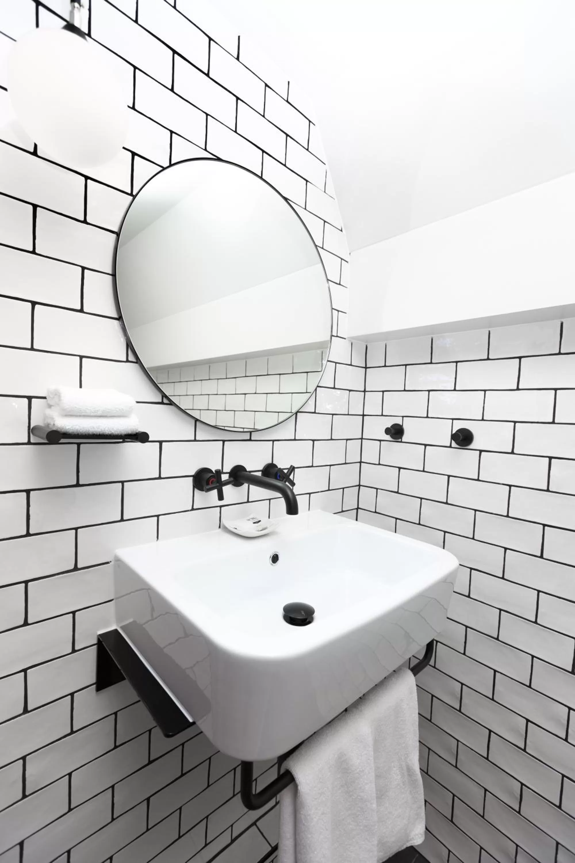 Bathroom in Ovolo Sydney Woolloomooloo, a Wyndham Hotel
