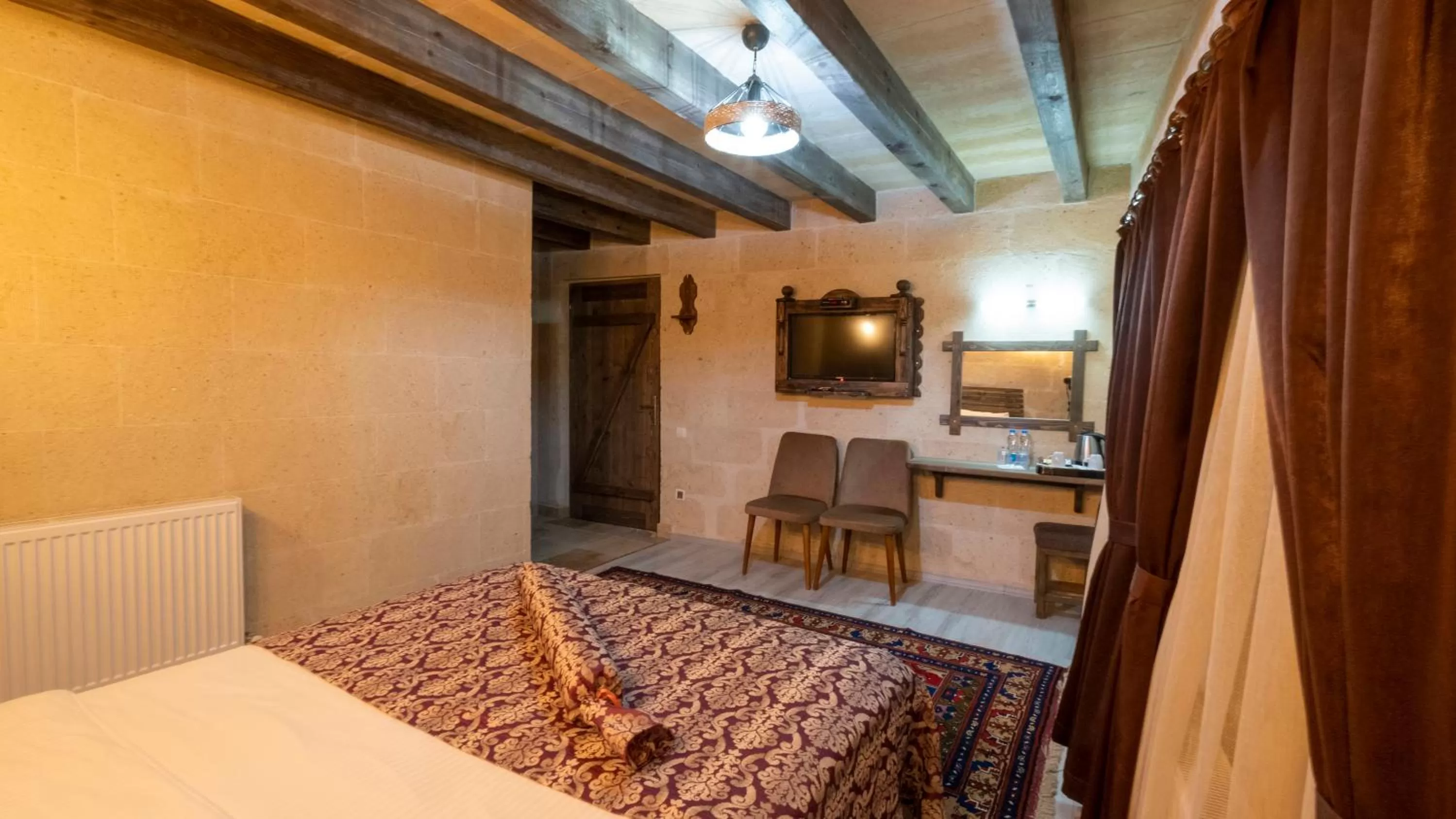 Photo of the whole room, Bed in In Stone House