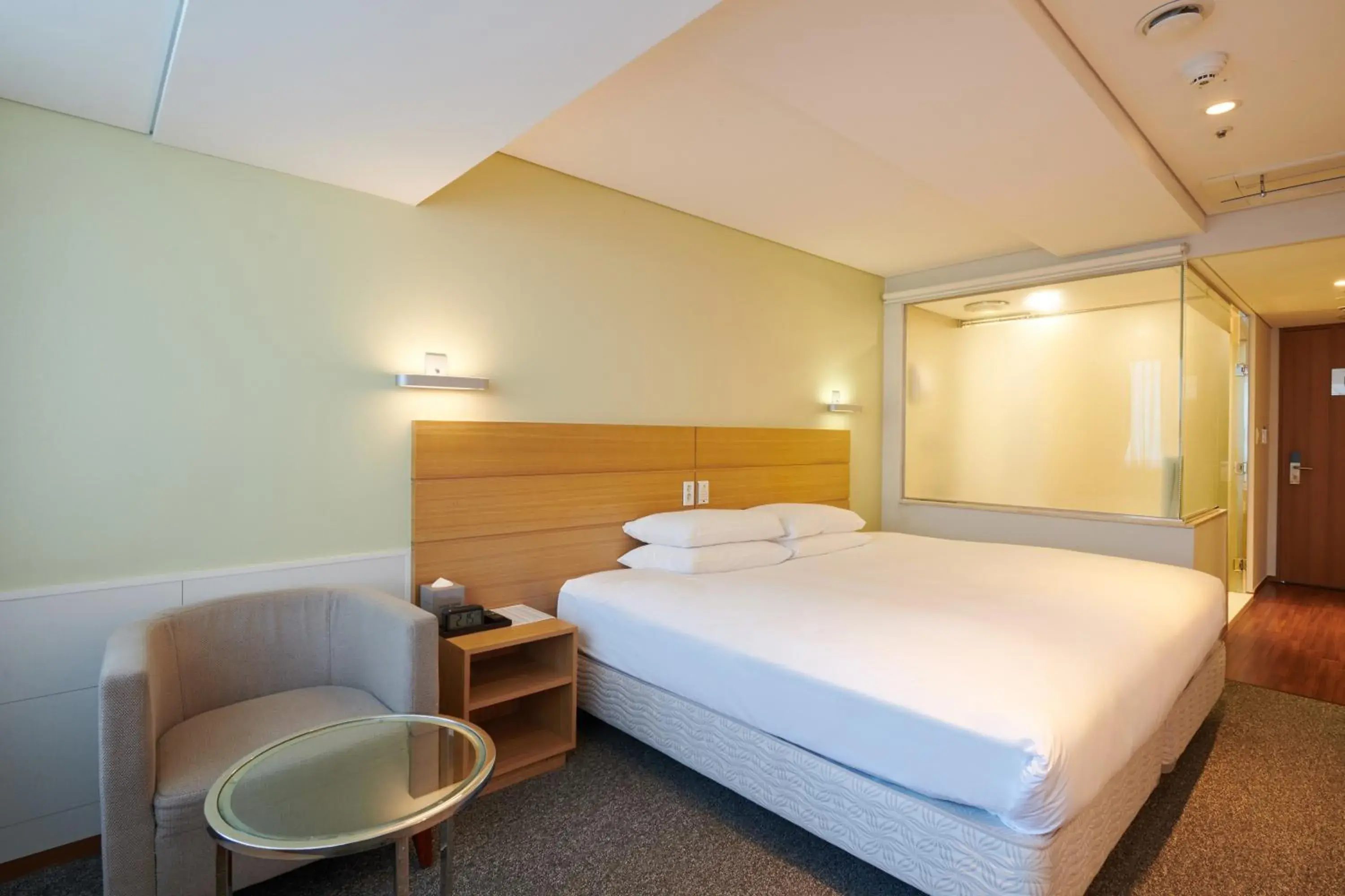 Bed in Nine Tree Hotel Myeongdong