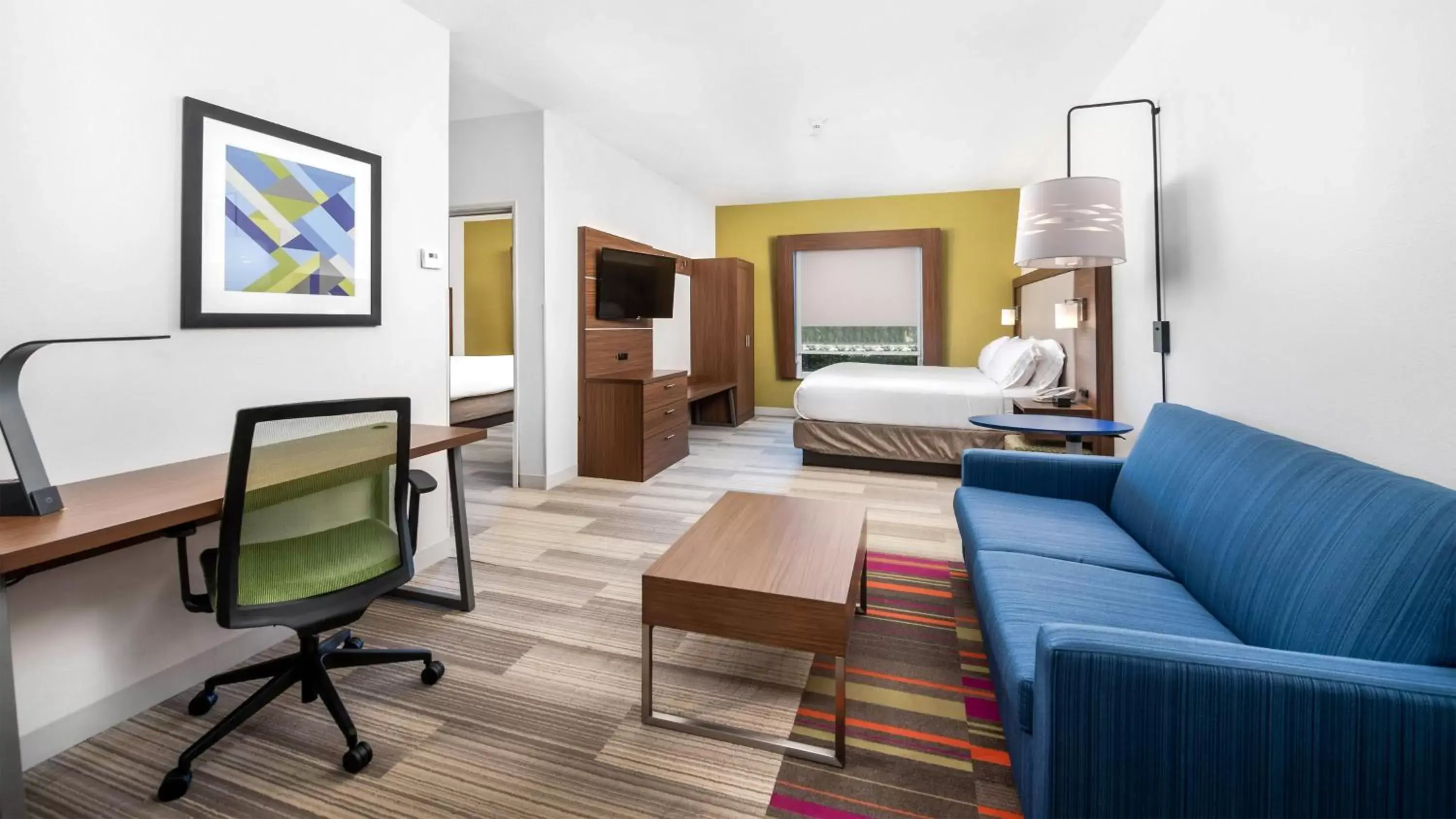 Bedroom, Seating Area in Holiday Inn Express Hotel and Suites Conroe, an IHG Hotel