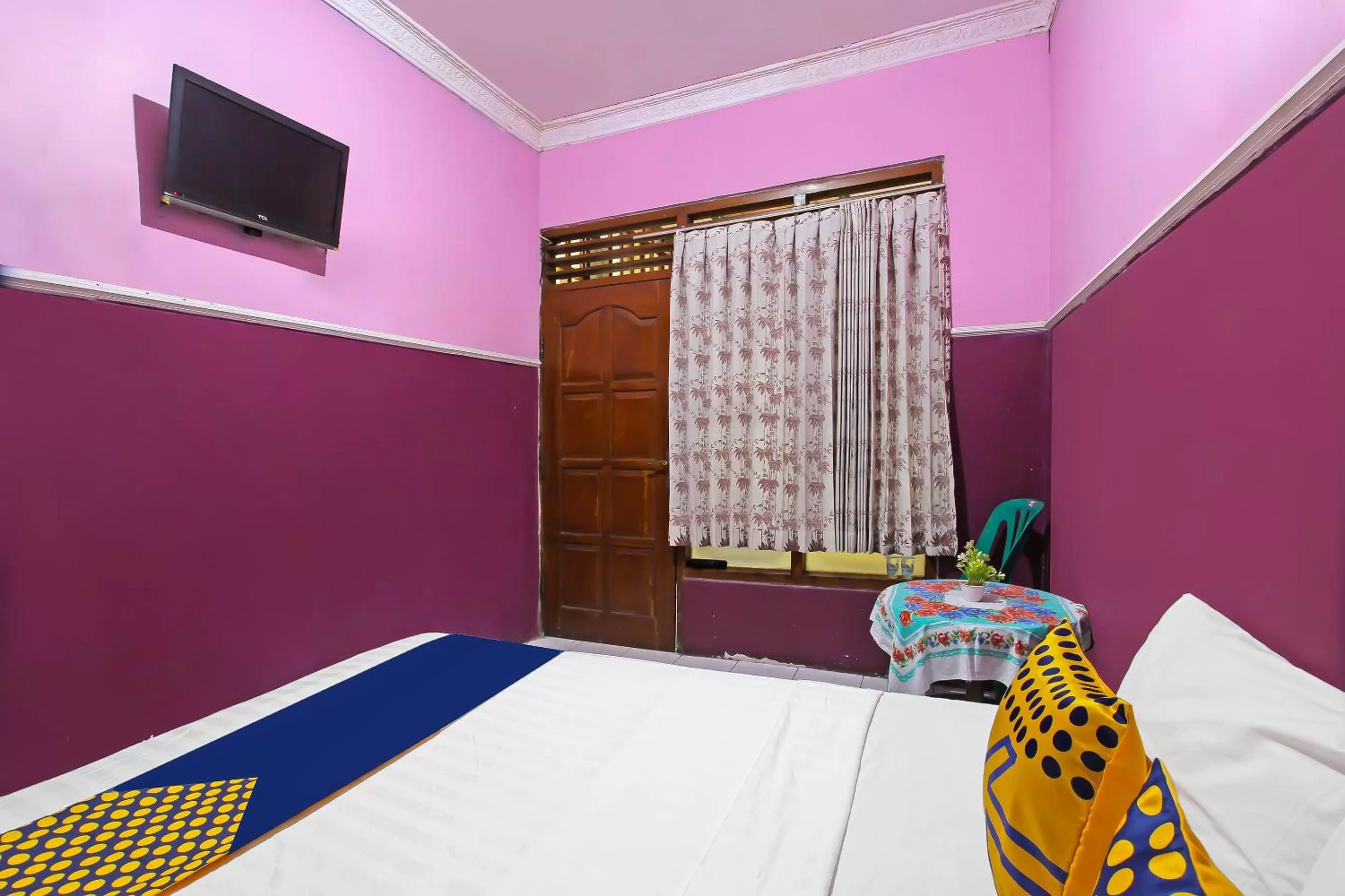 Bedroom in SPOT ON 91911 Rejeki Homestay Syariah Malioboro